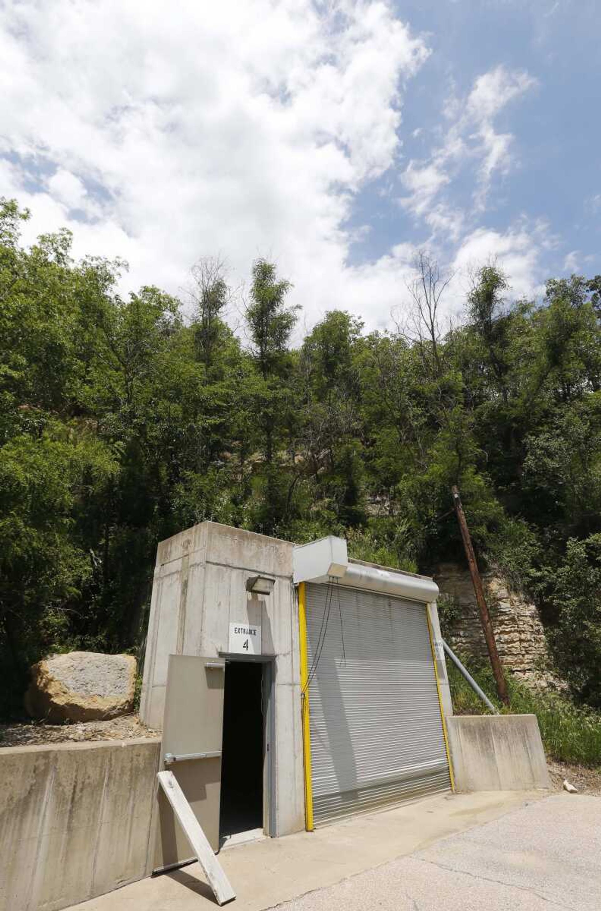 A door stands open at an entrance to the Vivos Shelter and Resort during a tour of the facility in Atchison, Kan., Tuesday, June 18, 2013. (AP Photo/Orlin Wagner)