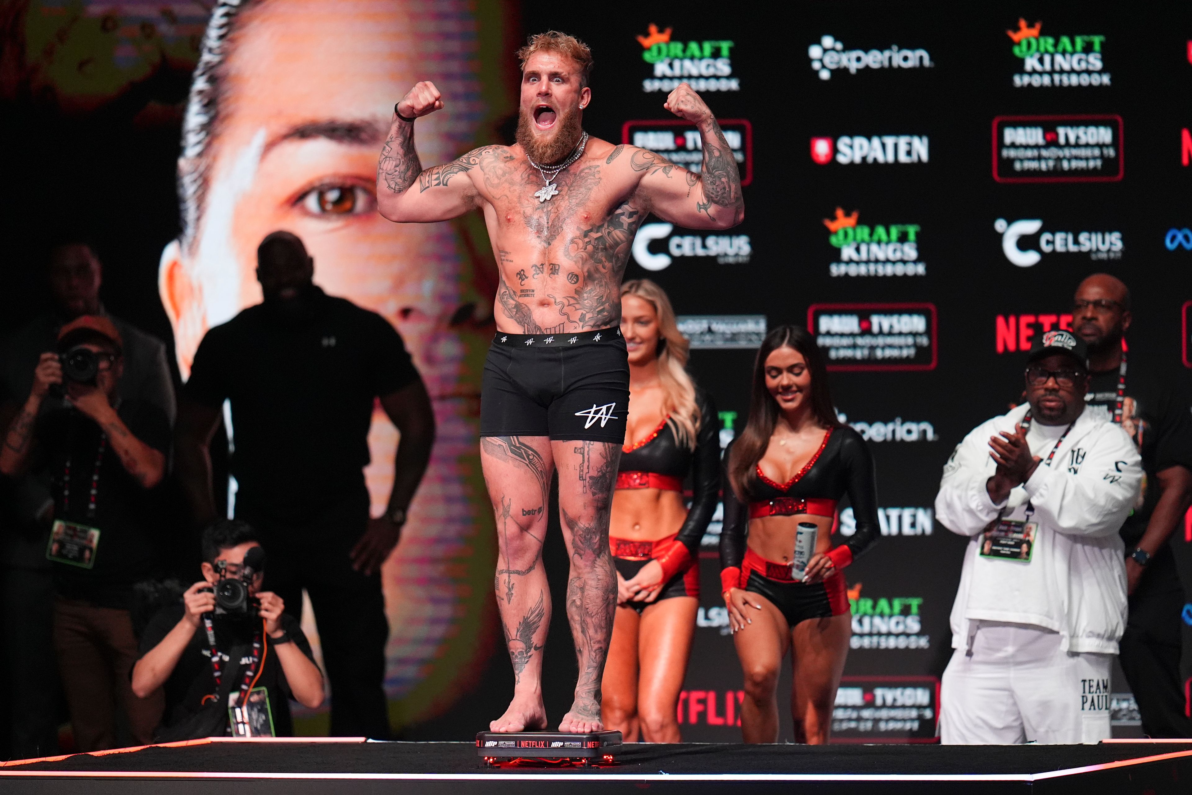 Jake Paul steps on the scale during a weigh-in ahead of his heavyweight bout against Mike Tyson, Thursday, Nov. 14, 2024, in Irving, Texas. (AP Photo/Julio Cortez)