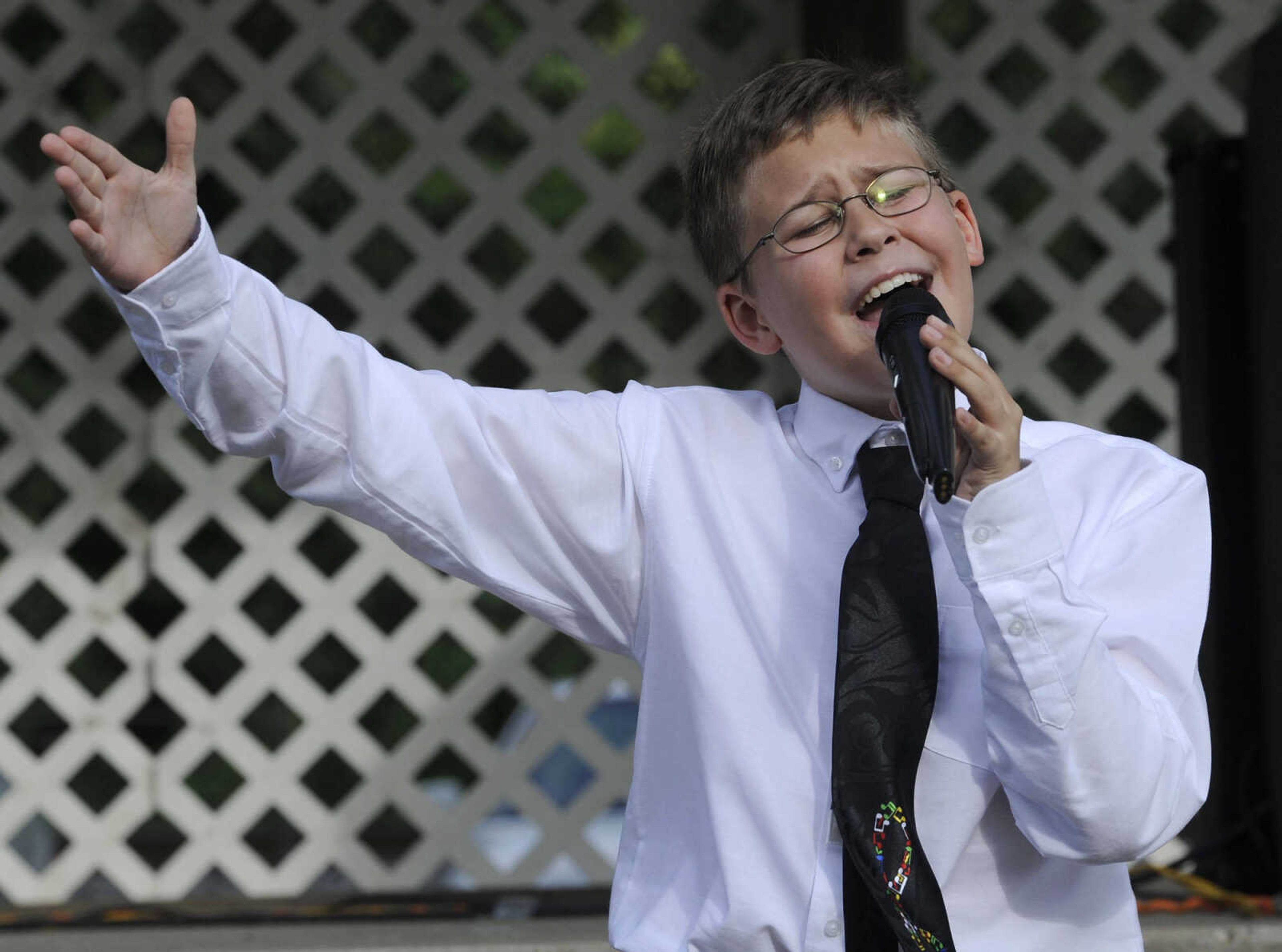 FRED LYNCH ~ flynch@semissourian.com
Ben Schumer performs "That's Where the Music Takes Me" in the Heartland Talent Showcase at German Days on Saturday, Aug. 9, 2014 at Frisco Park in Chaffee, Missouri.