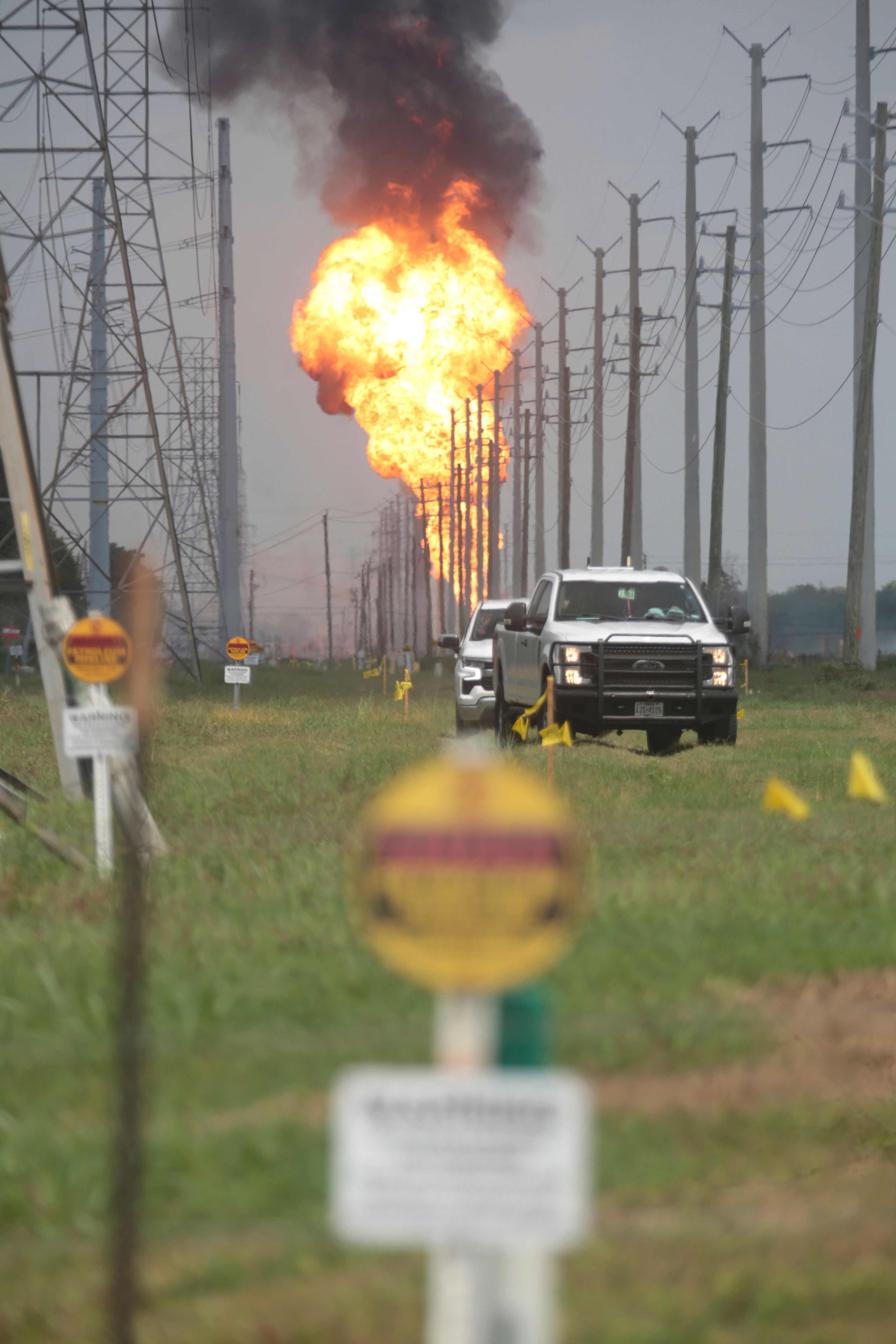 A pipeline carrying natural gas liquids burns in a massive fire near La Porte, Texas, on Monday, Sept. 16, 2024. (AP Photo/Lekan Oyekanmi)