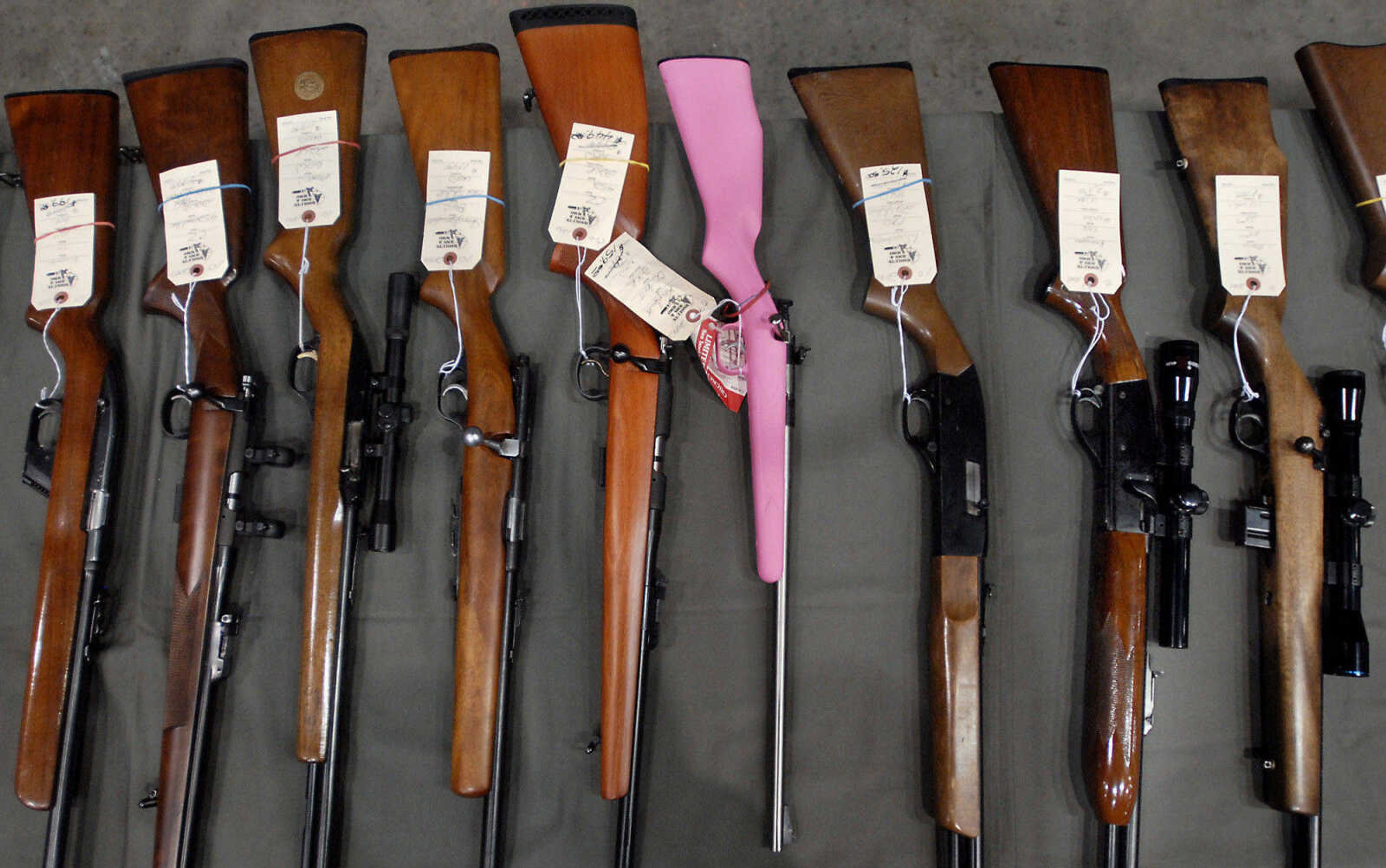 KRISTIN EBERTS ~ keberts@semissourian.com

A pink Cricket .22 Caliber Single Shot Rifle stands out among the other rifles on a display table by Absolute Arms and Ammo during the Missouri Gun and Knife Show on Saturday, Sept. 25, 2010, at the Show Me Center in Cape Girardeau.