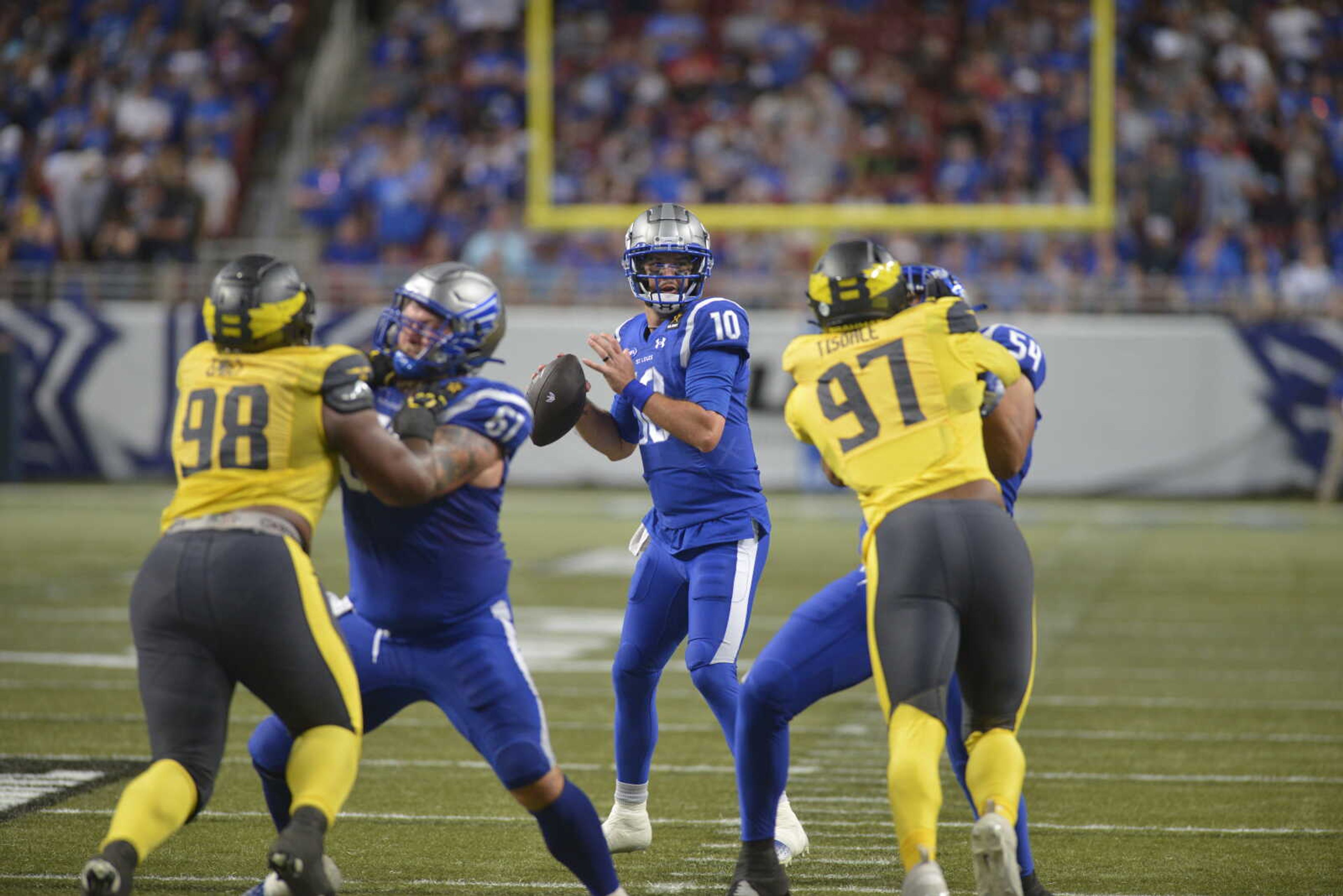 St. Louis Battlehawks quarterback AJ McCarron looks for an open receiver during a UFL game against the San Antonio Brahmas on Saturday, June 1, in St. Louis. 