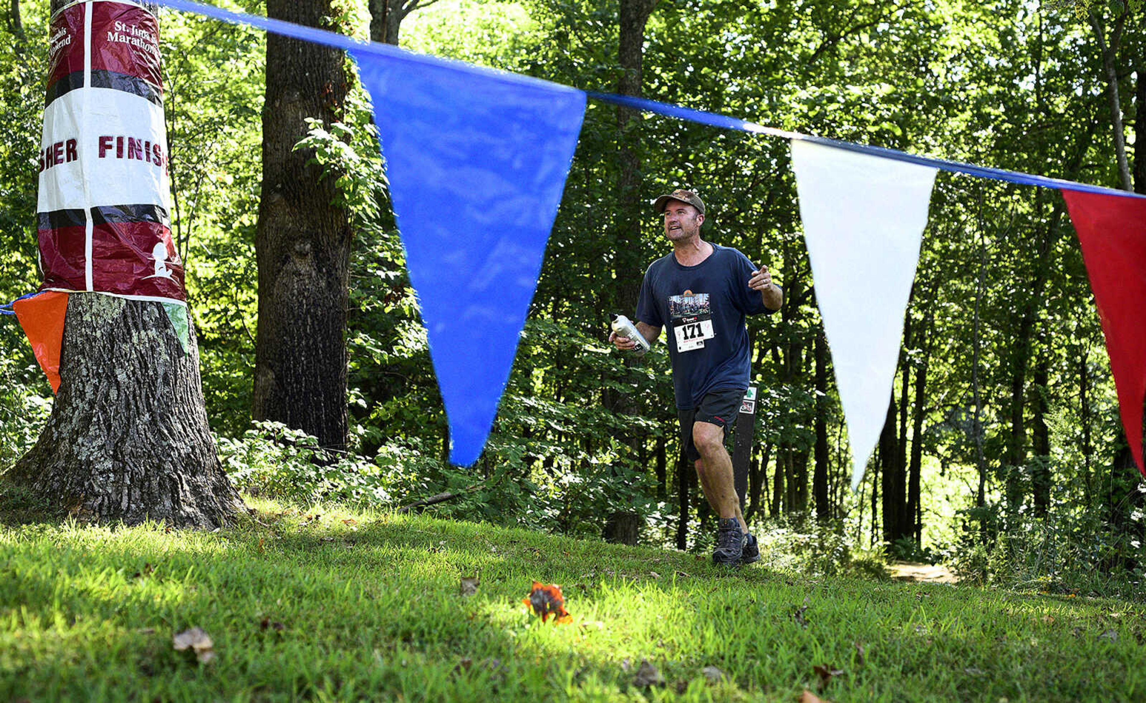 Participants run after kayaking on Lake Boutin during the first ever St. Jude Heroes Yak 'n Run on Saturday, Aug. 26, 2017, at Trail of Tears State Park. All proceeds from the event support St. Jude Children's Research Hospital