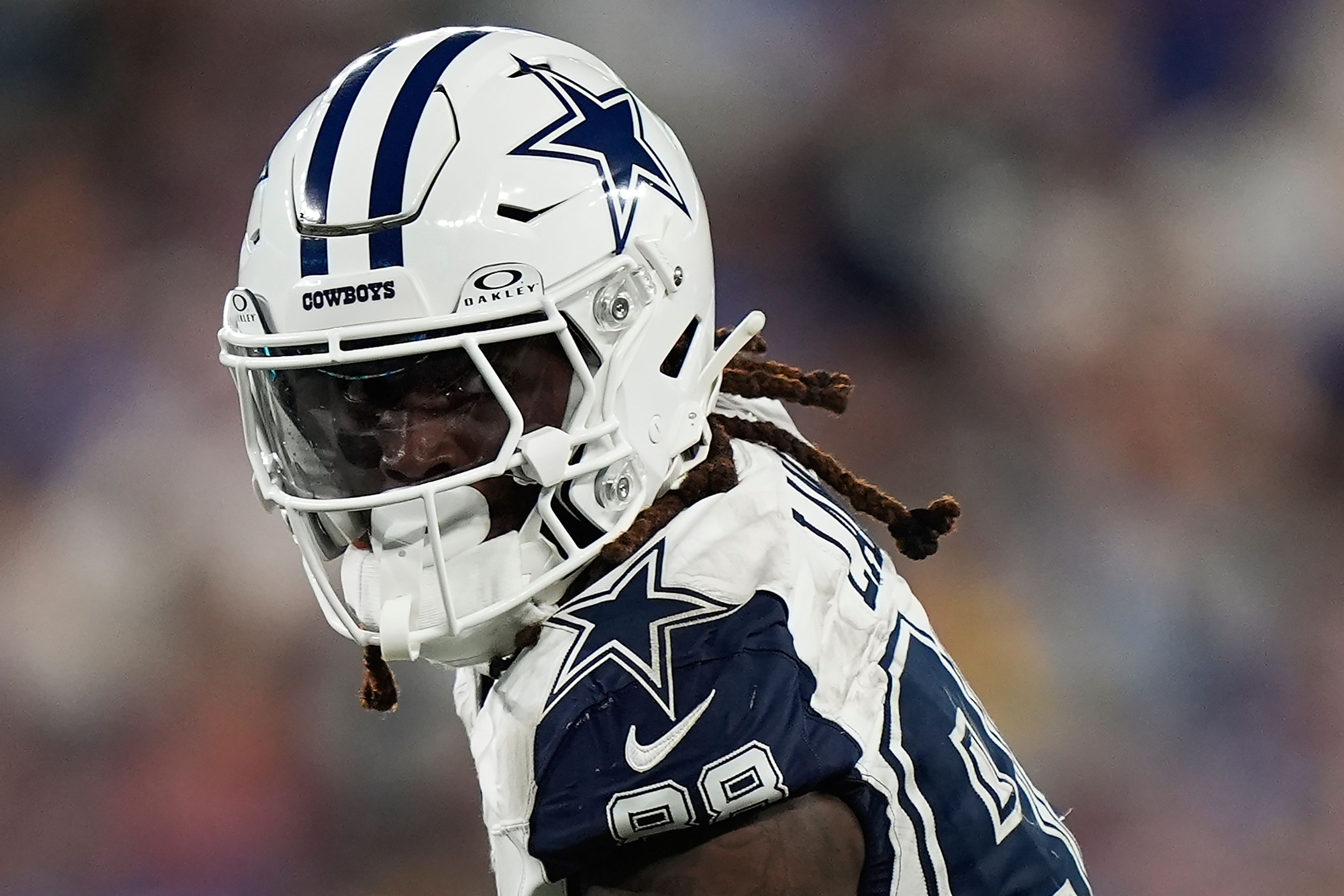 Dallas Cowboys wide receiver CeeDee Lamb (88) comes down with a pass on his way to scoring a touchdown against the New York Giants during the first half of an NFL football game, Thursday, Sept. 26, 2024, in East Rutherford, N.J. (AP Photo/Bryan Woolston)