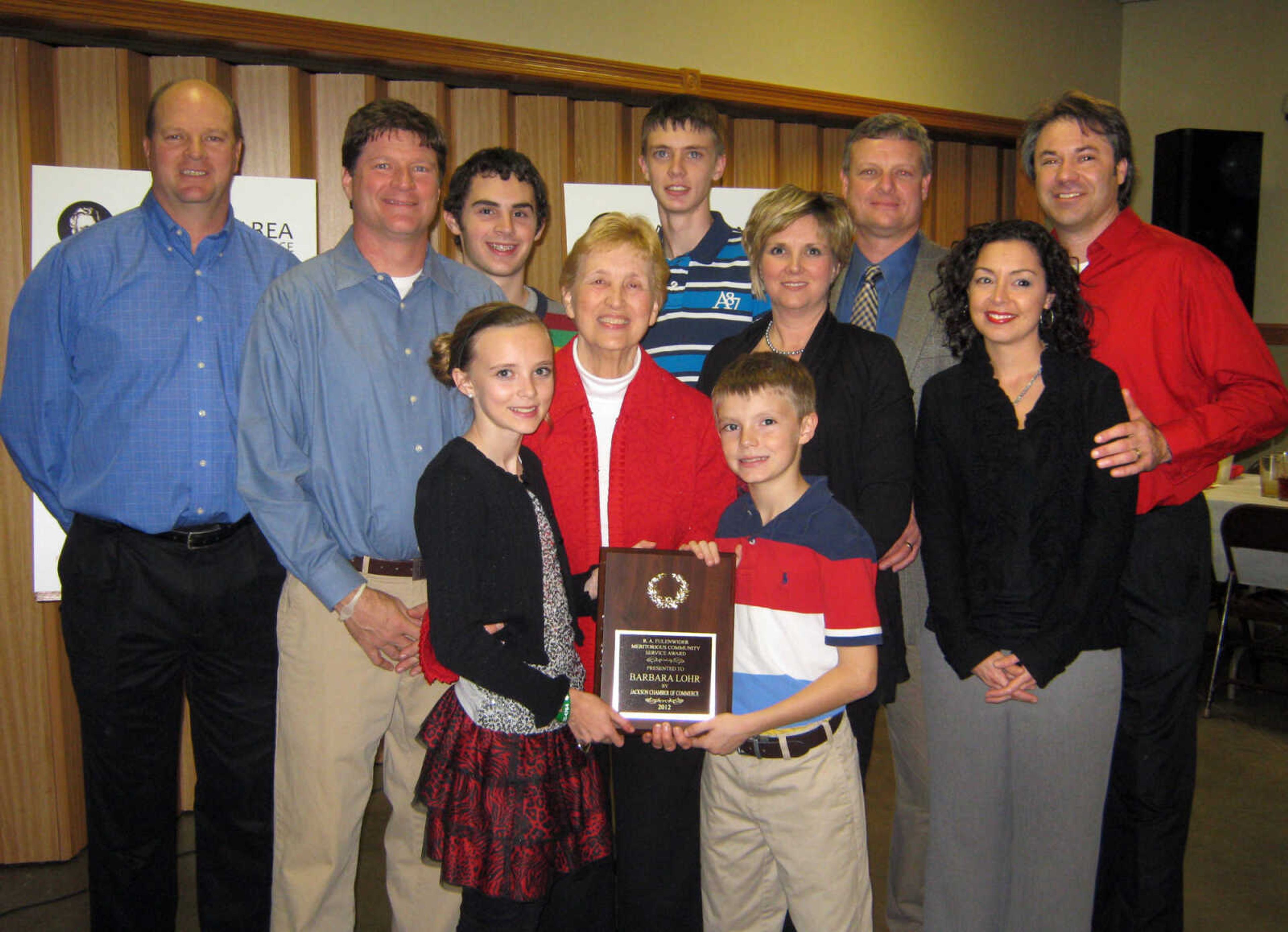 Jackson Mayor Barbara Lohr and her family celebrate her receiving the R.A. Fulenwider Meritorious Community Service Award, Jan. 11, at the Jackson Area Chamber of Commerce annual awards banquet at the Knights of Columbus Hall in Jackson, Mo.