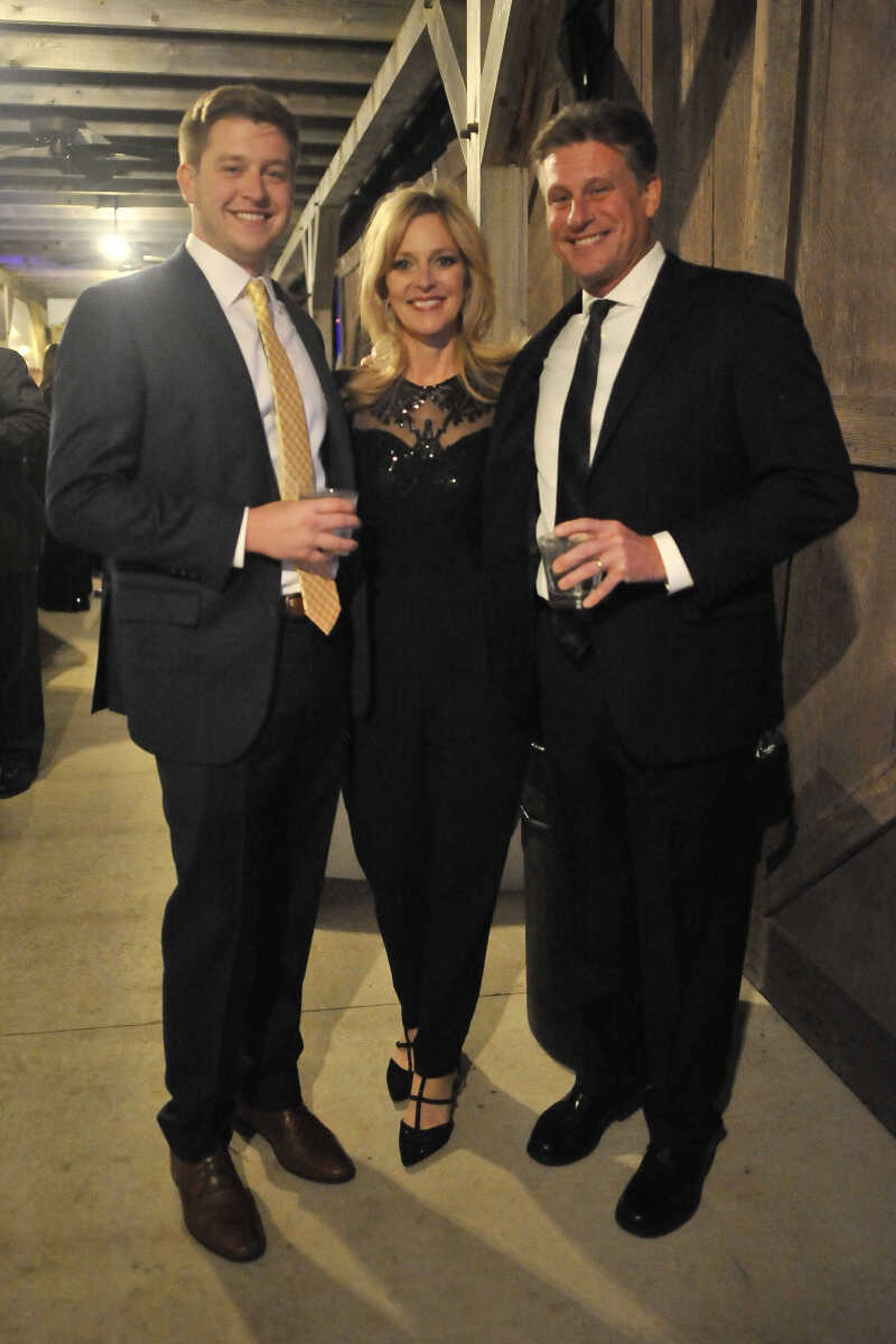 Nick, Lisa and Scott van Sciever pose for a photo during a fundraising gala for the American Cancer Society at Rusted Route Farms Saturday, Nov. 16, 2019, in Cape Girardeau.