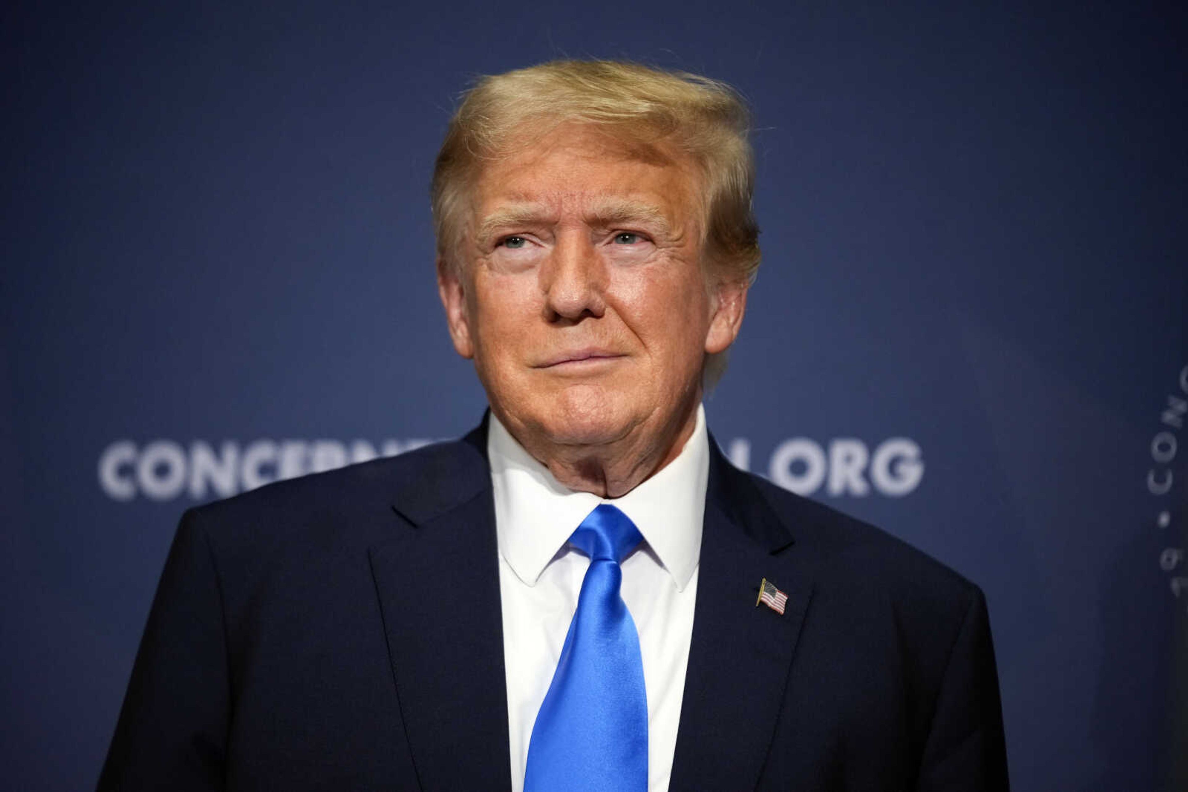 Former President Donald Trump stands before speaking at a Concerned Women for America Summit at the Capitol Hilton on Sept. 15 in Washington.