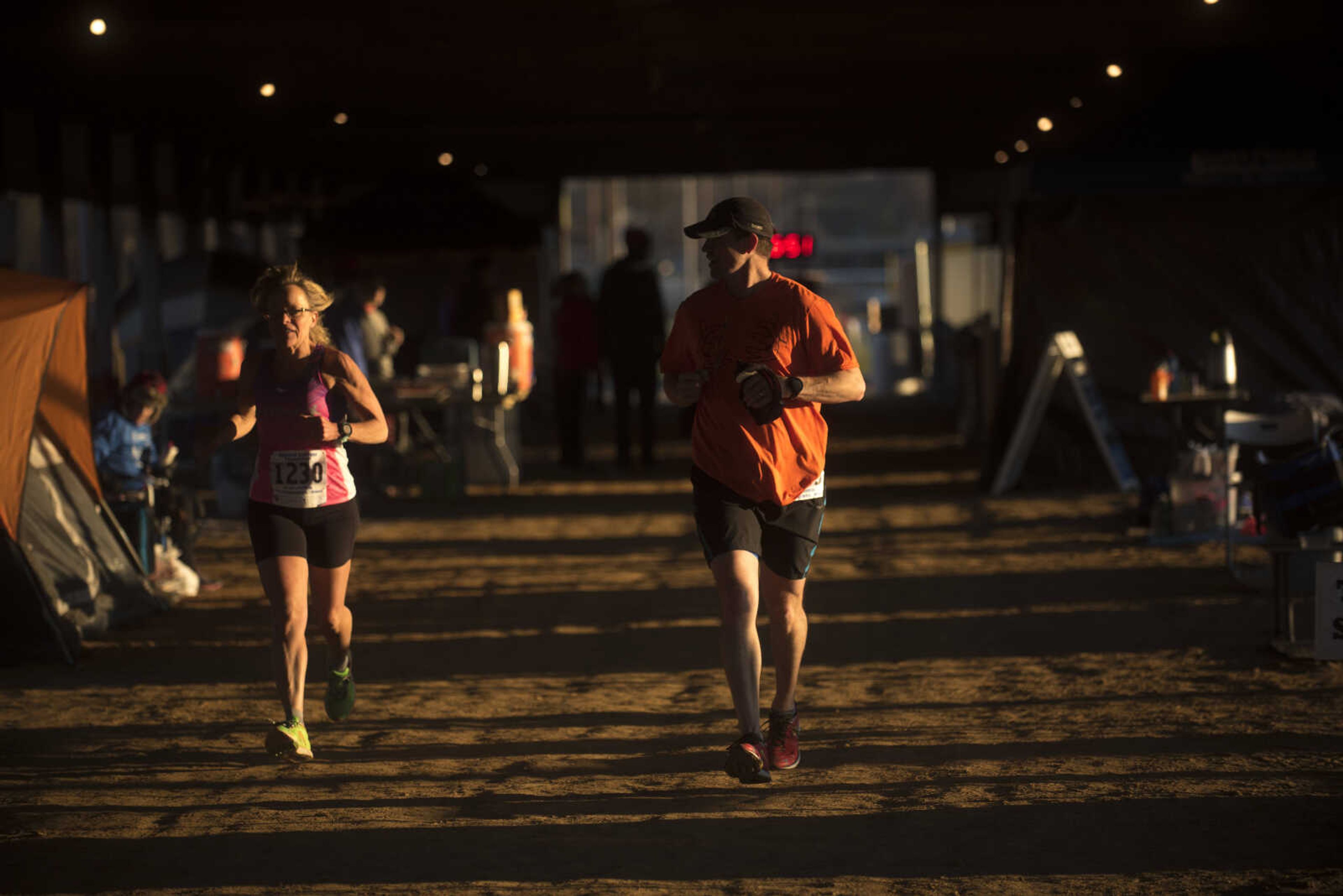 Participants make their way around the 1-mile loop set up at Arena Park for the 8th annual Howard Aslinger Endurance Run on Saturday, March 18, 2017 in Cape Girardeau. The event raises money for the Howard L. Aslinger Memorial Scholarship where runners will keep running until they can't anymore with the event starting at 7 p.m. Friday night going for 24 hours until Saturday night.