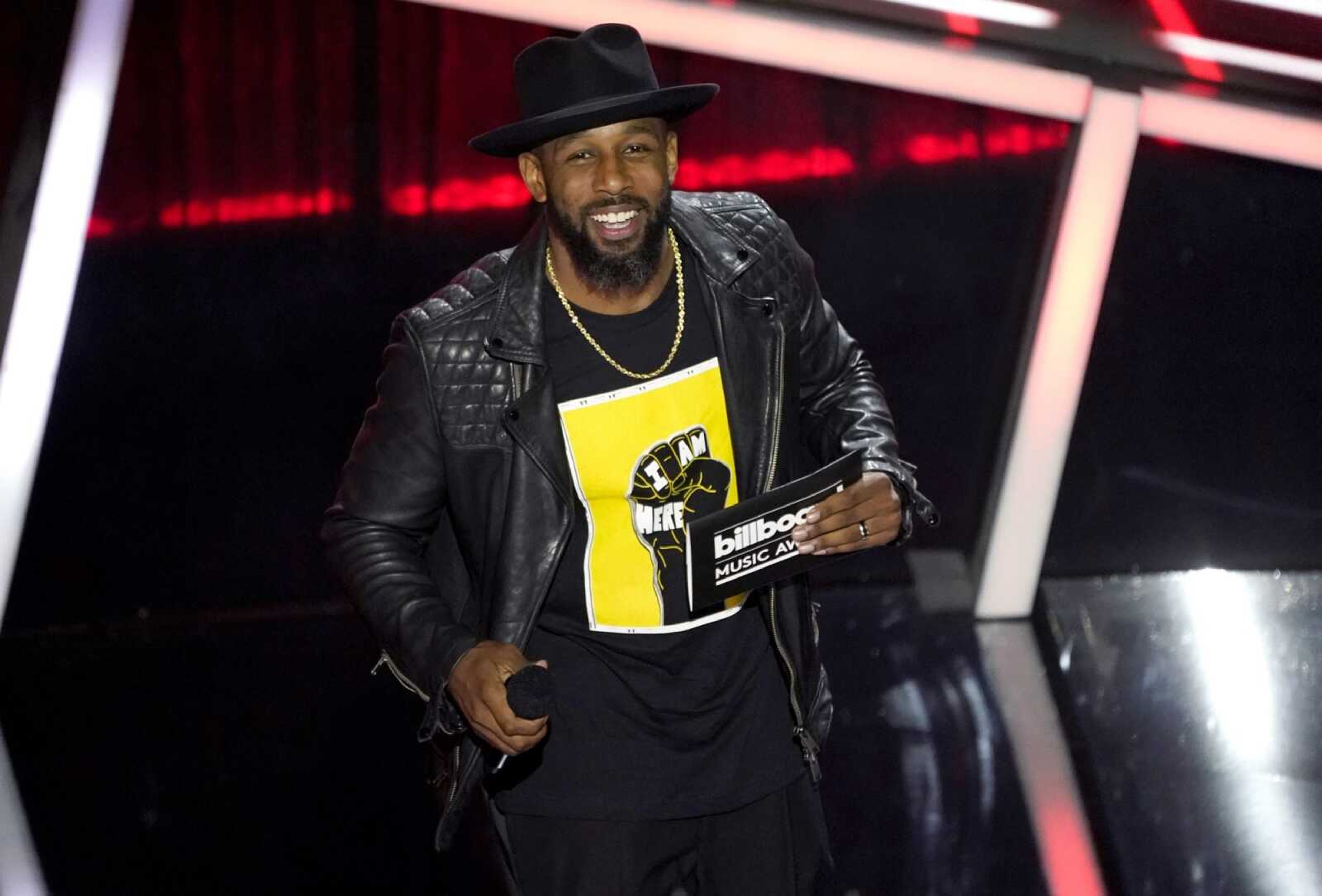 Stephen "tWitch" Boss presents the award for top Latin artist at the Billboard Music Awards in Los Angeles in 2020.