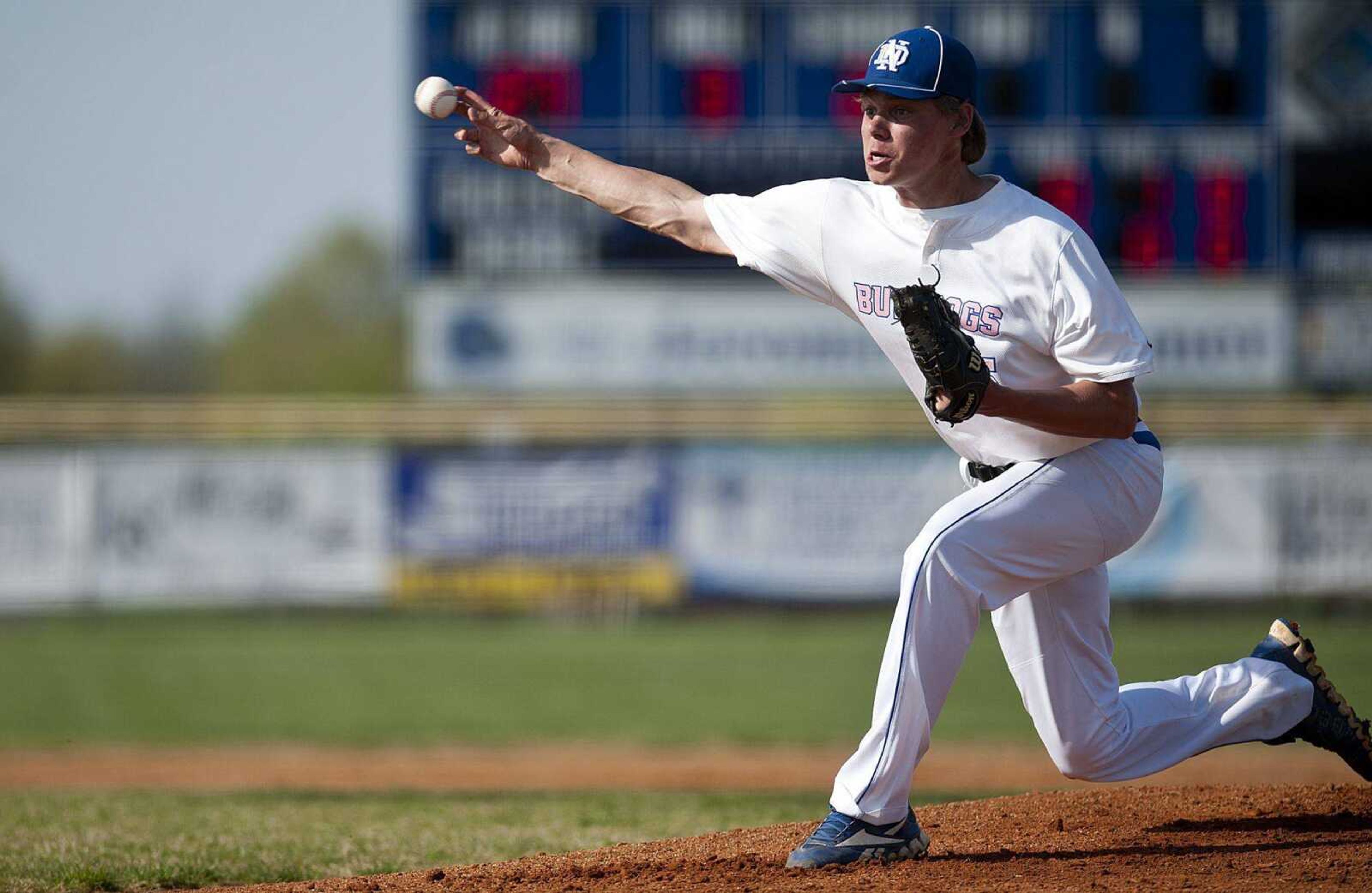 Notre Dame pitcher Ross James throws a strike to Perryville pitcher Trent Green in the first inning of the Bulldogs' 11-1 six-inning win over the Pirates Wednesday, April 23, at Notre Dame Regional High School. (Adam Vogler)