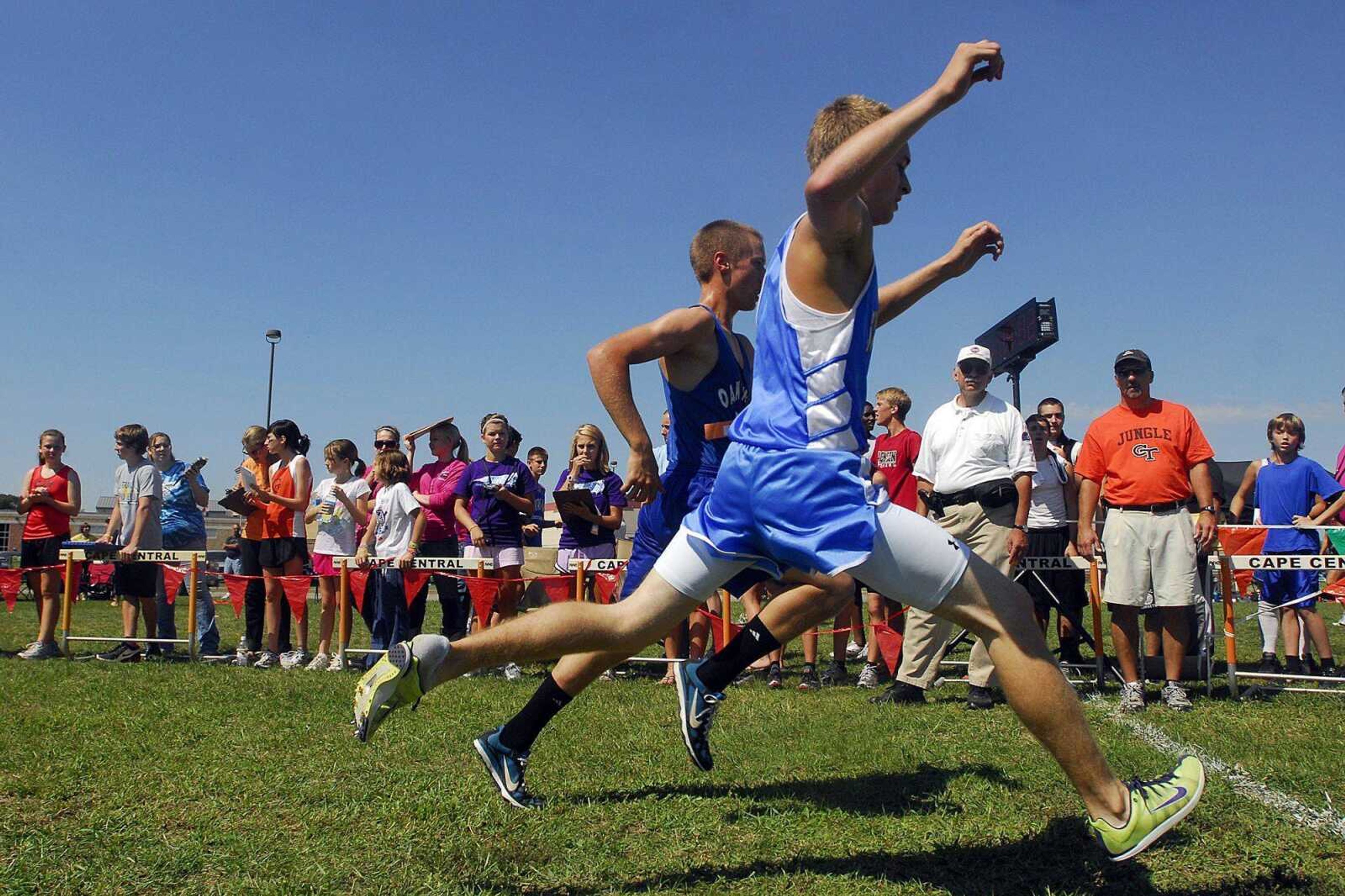 Scott City sophomore Eric Essner finishes a step ahead of Oak Ridge sophomore Ethan Seyer during Saturday's Central Tiger Time Invitational. (Laura Simon)