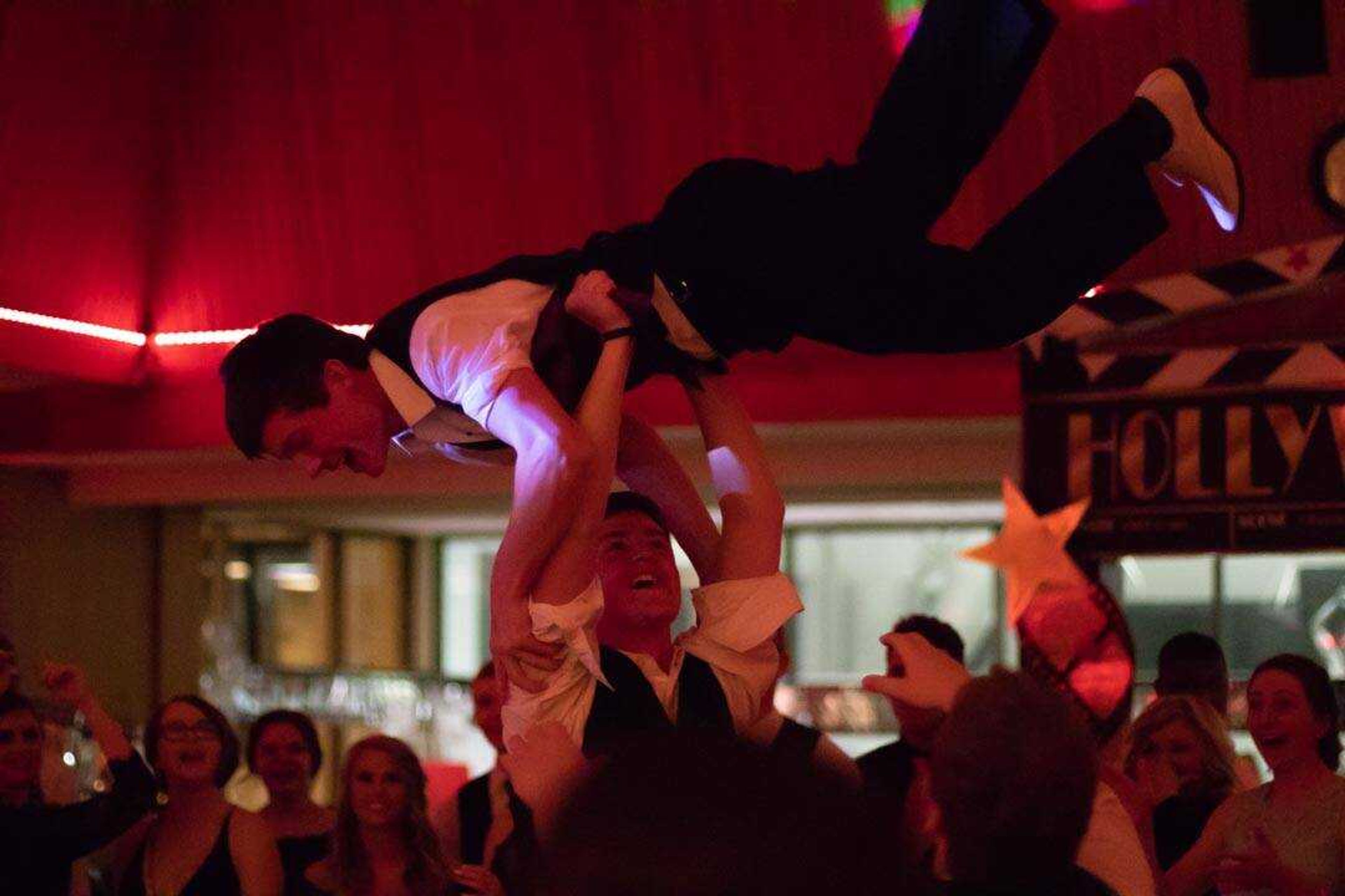 Breven Yarbro lifts Kaleb Ballard into the air at the Chaffee High School prom&nbsp;Saturday, April 6, 2019,&nbsp;in the University Ballroom.