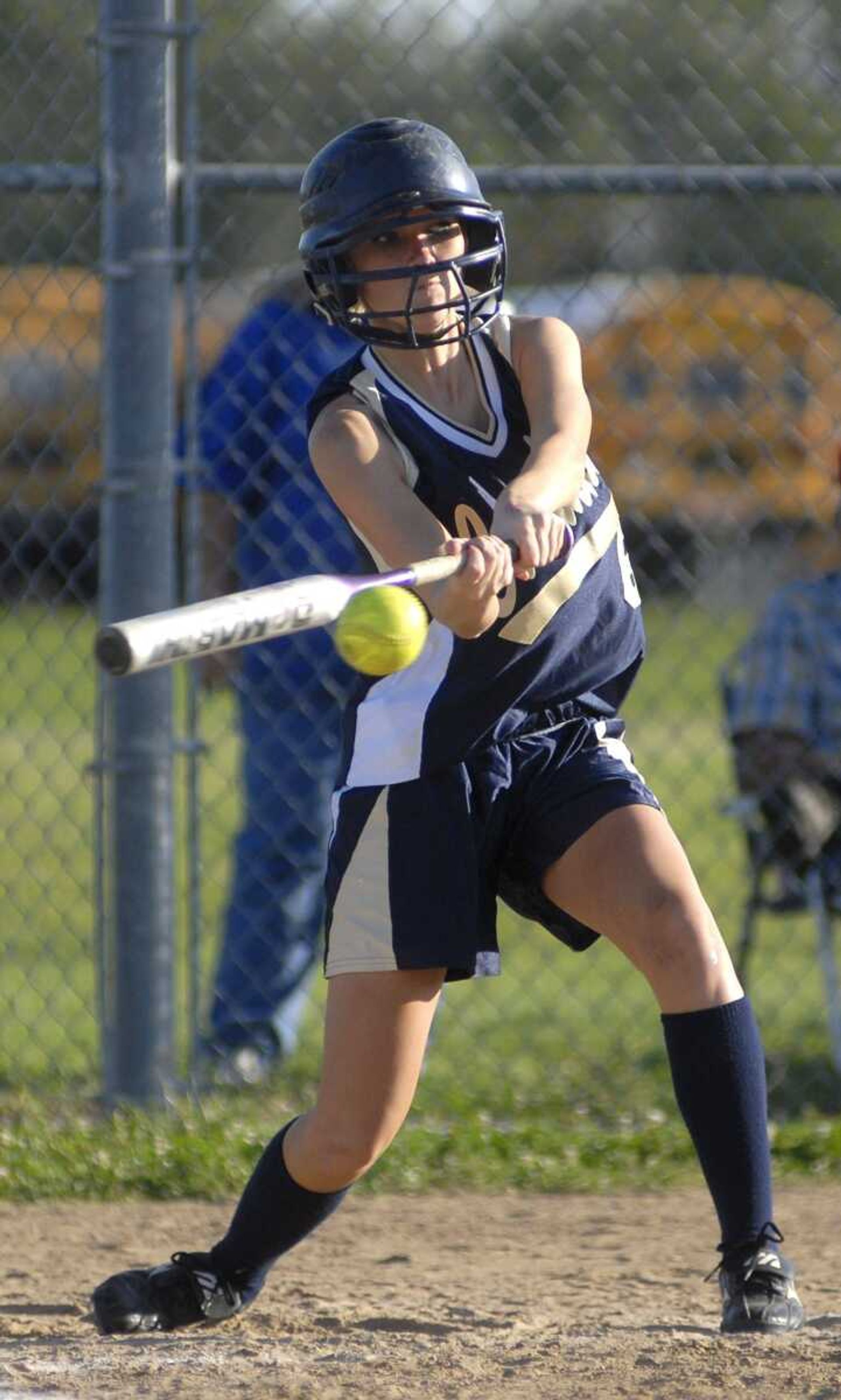 CHUCK WU ~ cwu@semissourian.com
Saxony Lutheran's Kayla Overbeck makes contact with a pitch during the Crusaders' 6-4 loss to Scott City on Tuesday.