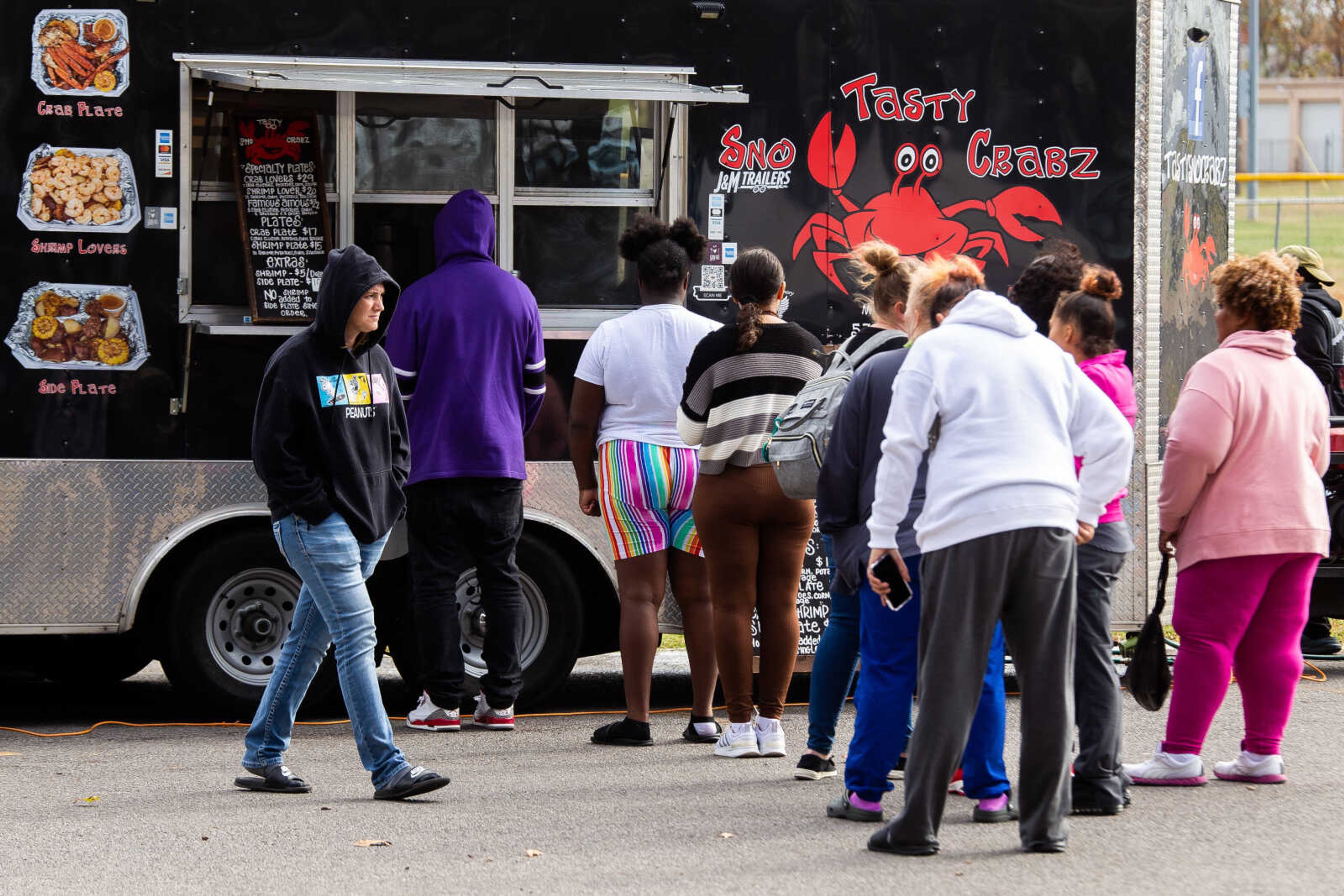 Customers form a line in front of Tasty Sno Crabz food truck&nbsp;on Saturday, Nov. 5 at the Food Truck Rally.