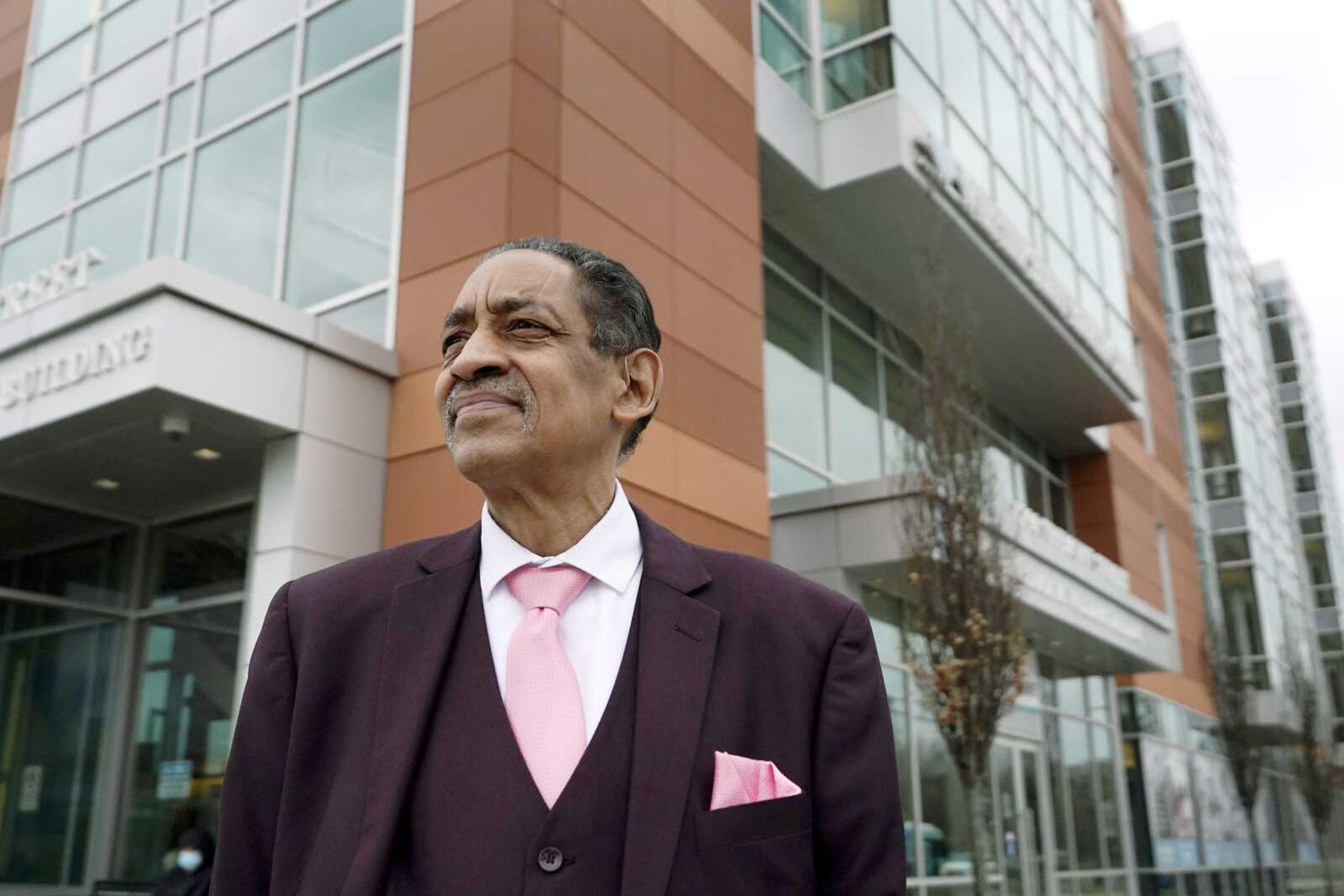 Nestor Castro, 67, of Cambridge, Massachusetts, poses for a photo at Whittier Street Health Center on March 31 in Boston, where he volunteers. Just before Christmas in 2021, Castro got a permanent subsidized apartment through Hearth Inc., a Boston not-for-profit dedicated to ending homelessness among older adults.