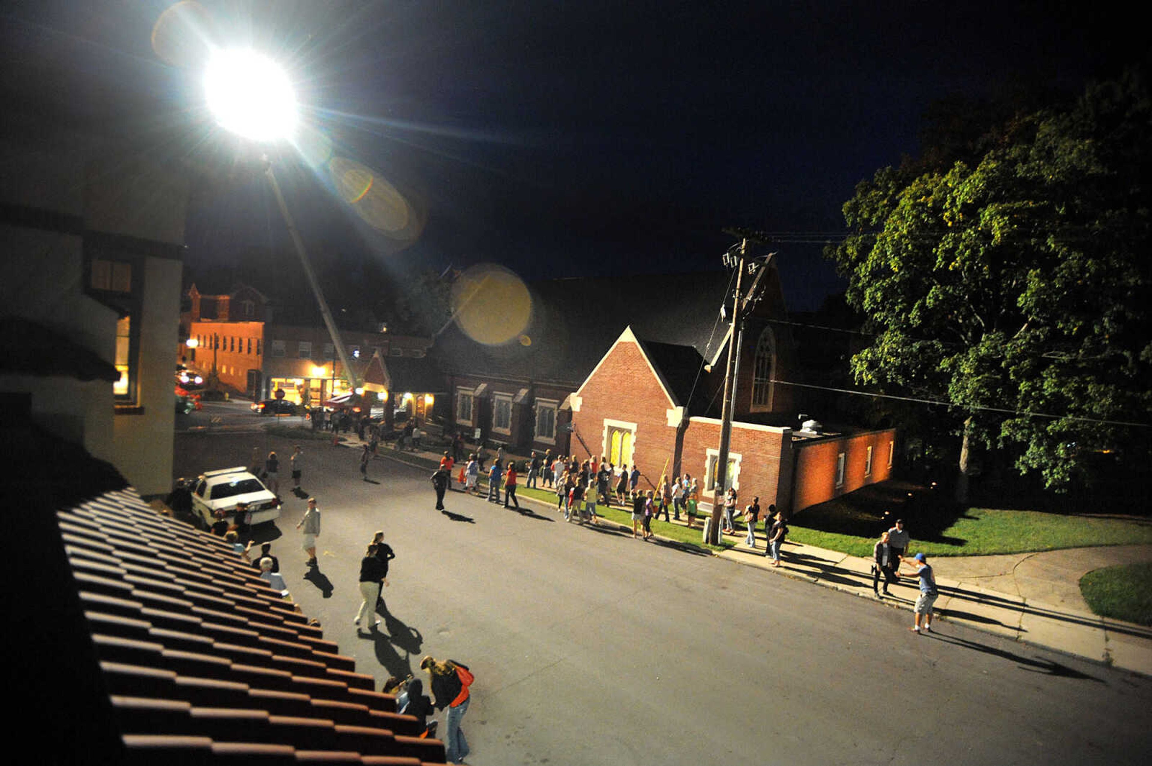 LAURA SIMON ~ lsimon@semissourian.com

Onlookers line Lorimier Street as filming for 20th Century Fox's feature film "Gone Girl" gets underway at the Common Pleas Courthouse, Thursday, Oct. 3, 2013, in Cape Girardeau.