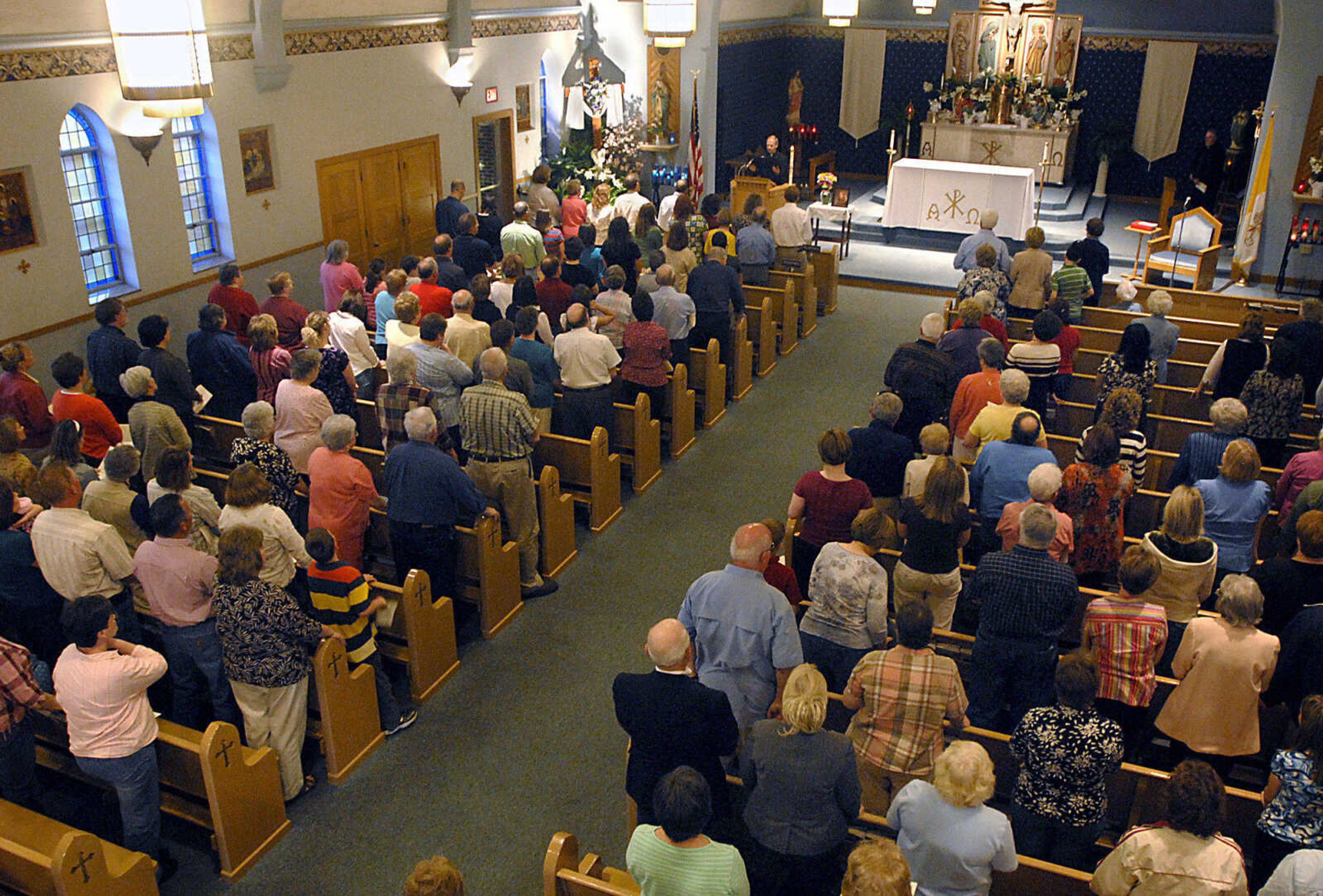 KIT DOYLE ~ kdoyle@semissourian.com
Two hundred people take part in a prayer service for Cheryl Scherer Friday, April 17, 2009, at St. Denis Church in Benton.