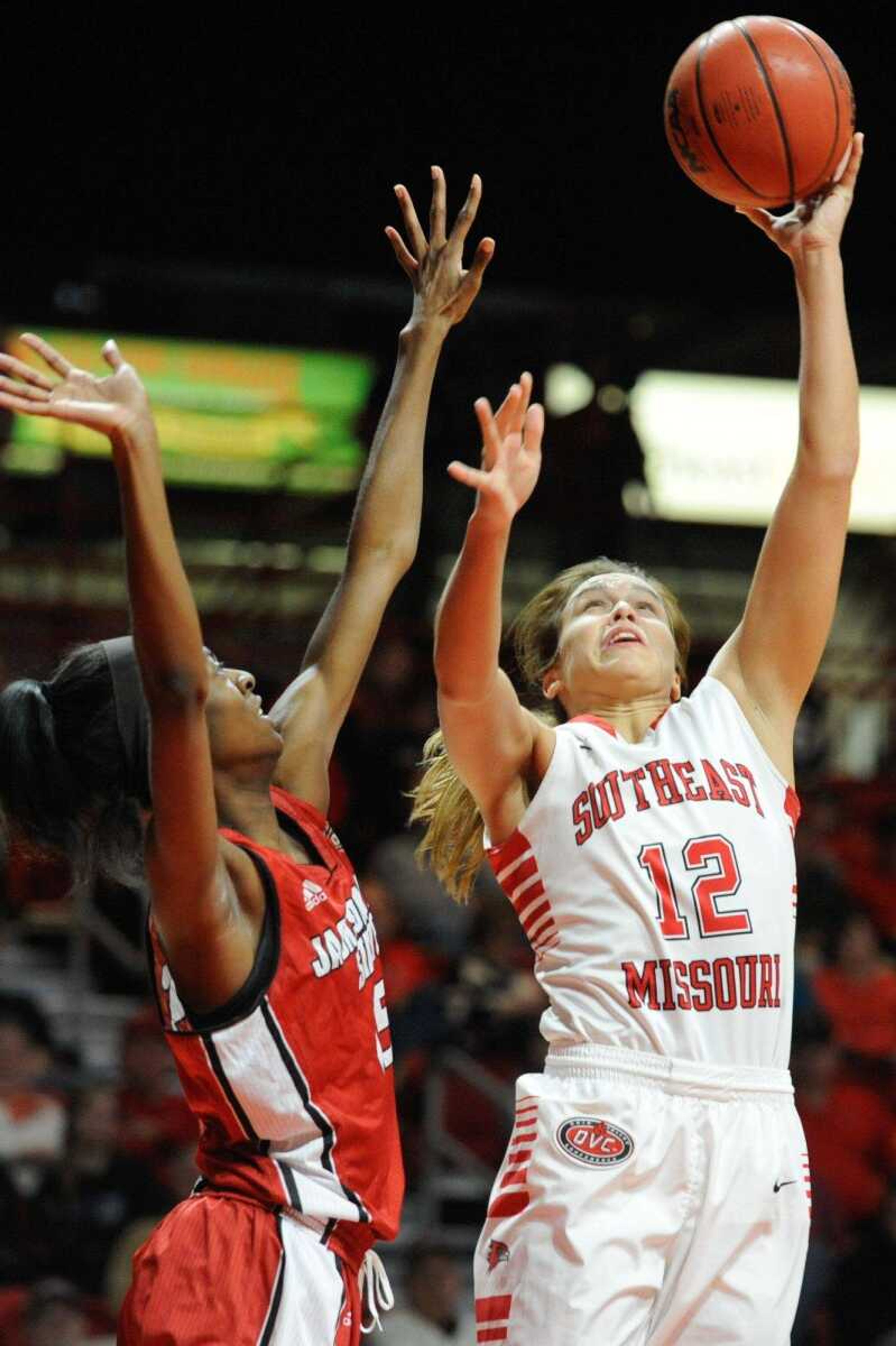 Southeast Missouri State's Erin Bollmann shoots past Jacksonville State's Chloe Long in the first quarter Wednesday at the Show Me Center. (Glenn Landberg)