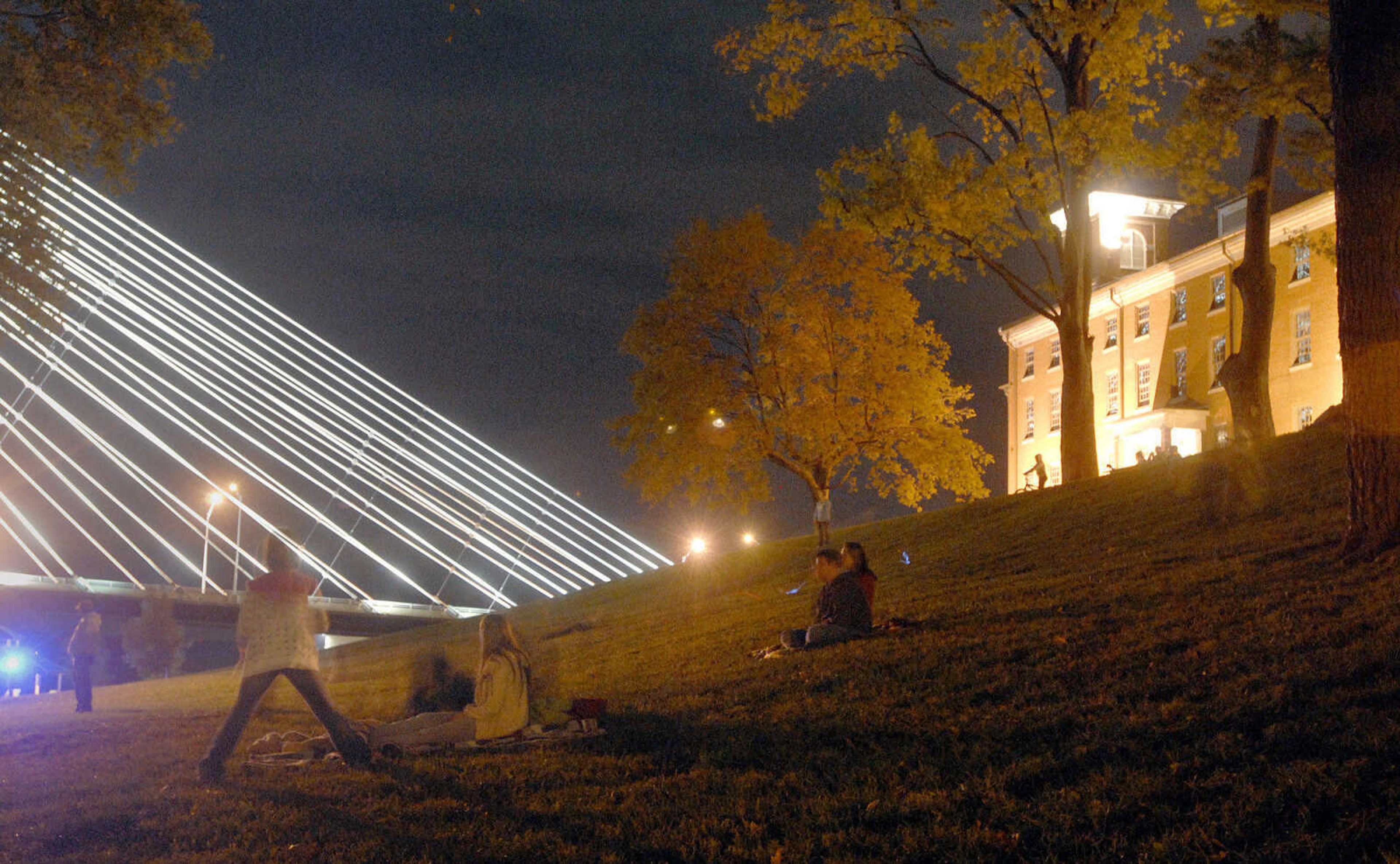 LAURA SIMON ~ lsimon@semissourian.com
The crowd listens to bone chilling tales from story tellers Regina Carpenter and Gayle Ross Friday, October 14, 2011 during an evening of Ghost Storytelling at the east lawn of the River Campus of Southeast Missouri State University in Cape Girardeau.