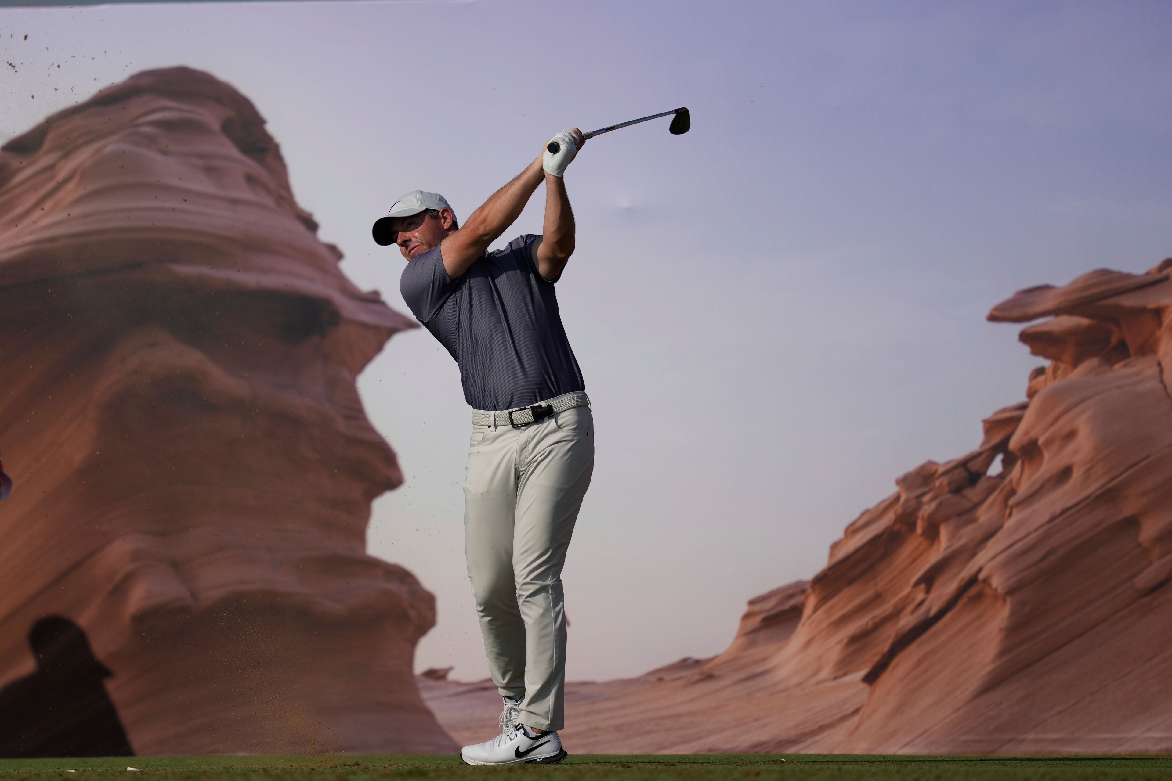 Rory McIlroy of Northern Ireland tees off on 15th hole during the second round of Abu Dhabi Golf Championship in Abu Dhabi, United Arab Emirates, Friday, Nov. 8, 2024. (AP Photo/Altaf Qadri)