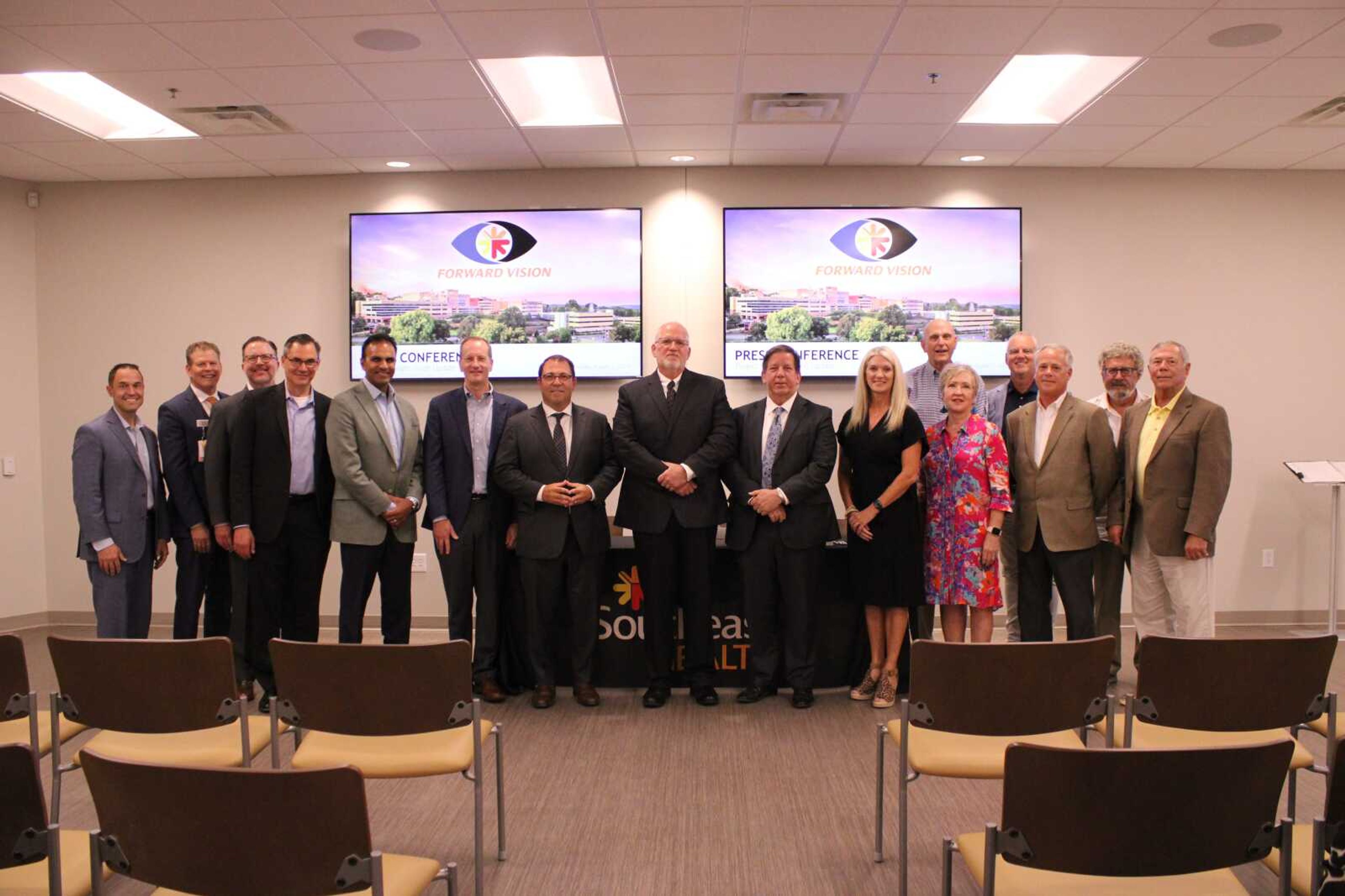 Alyssa Lunsford ~alunsford@semissourian.com  Mercy board members stand for a photo during the Tuesday, Aug. 1, news conference.  The news conference informed the upcoming changes and benefits of SoutheastHEALTH and Mercy combining.