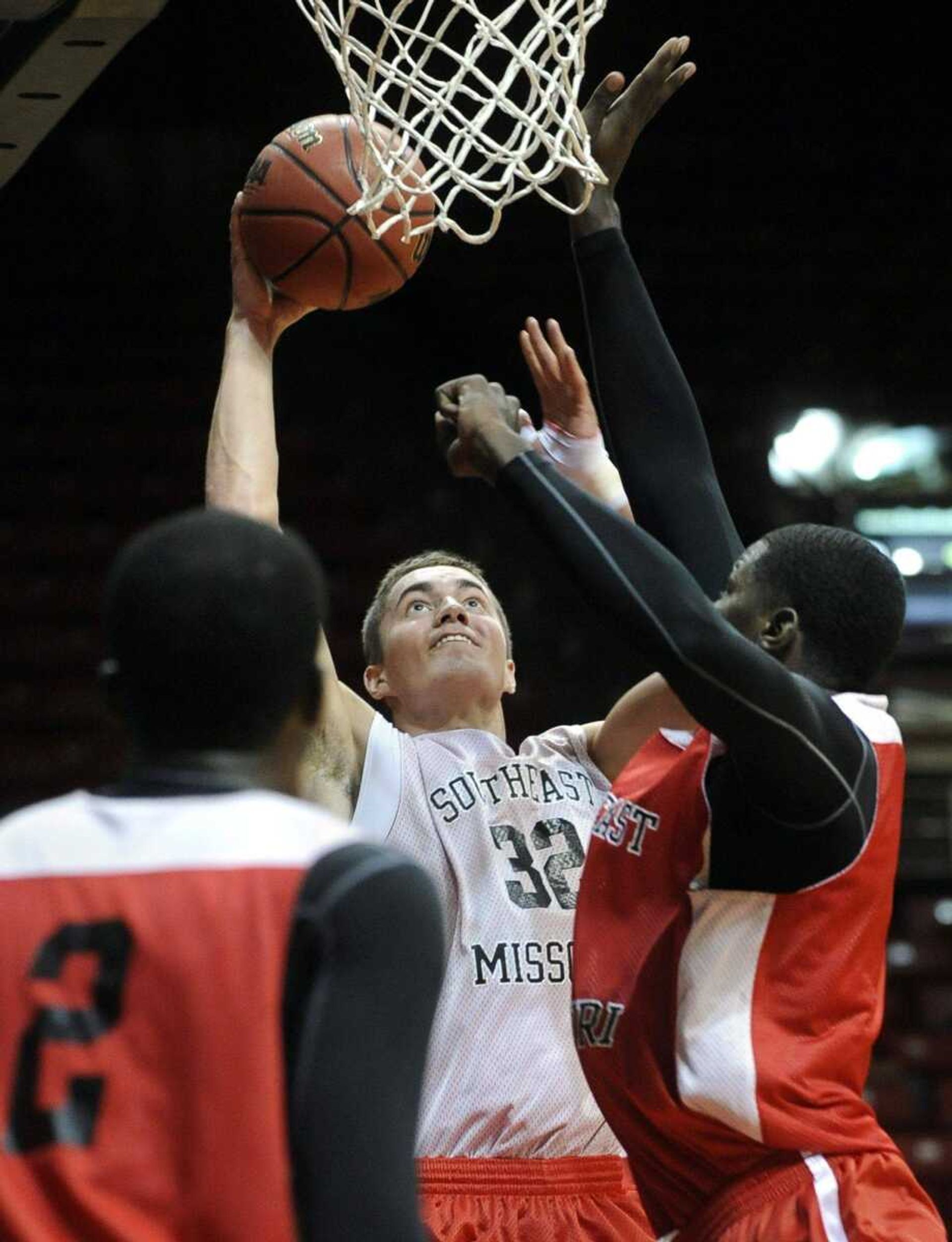 Jacob Tolbert tries to shoot for the white team while guarded by the red team's Nino Johnson during a scrimmage by Southeast Missouri State Saturday, Oct. 20, 2012 at the Show Me Center. (Fred Lynch)