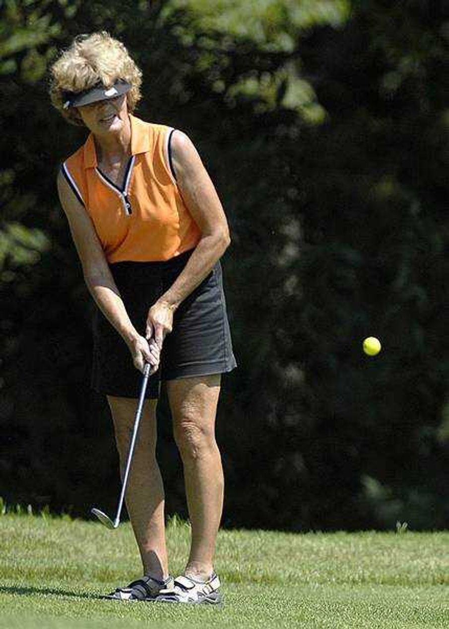 JoAnn Taylor chipped onto the 11th green Thursday during the second round of the Lassies Classic.