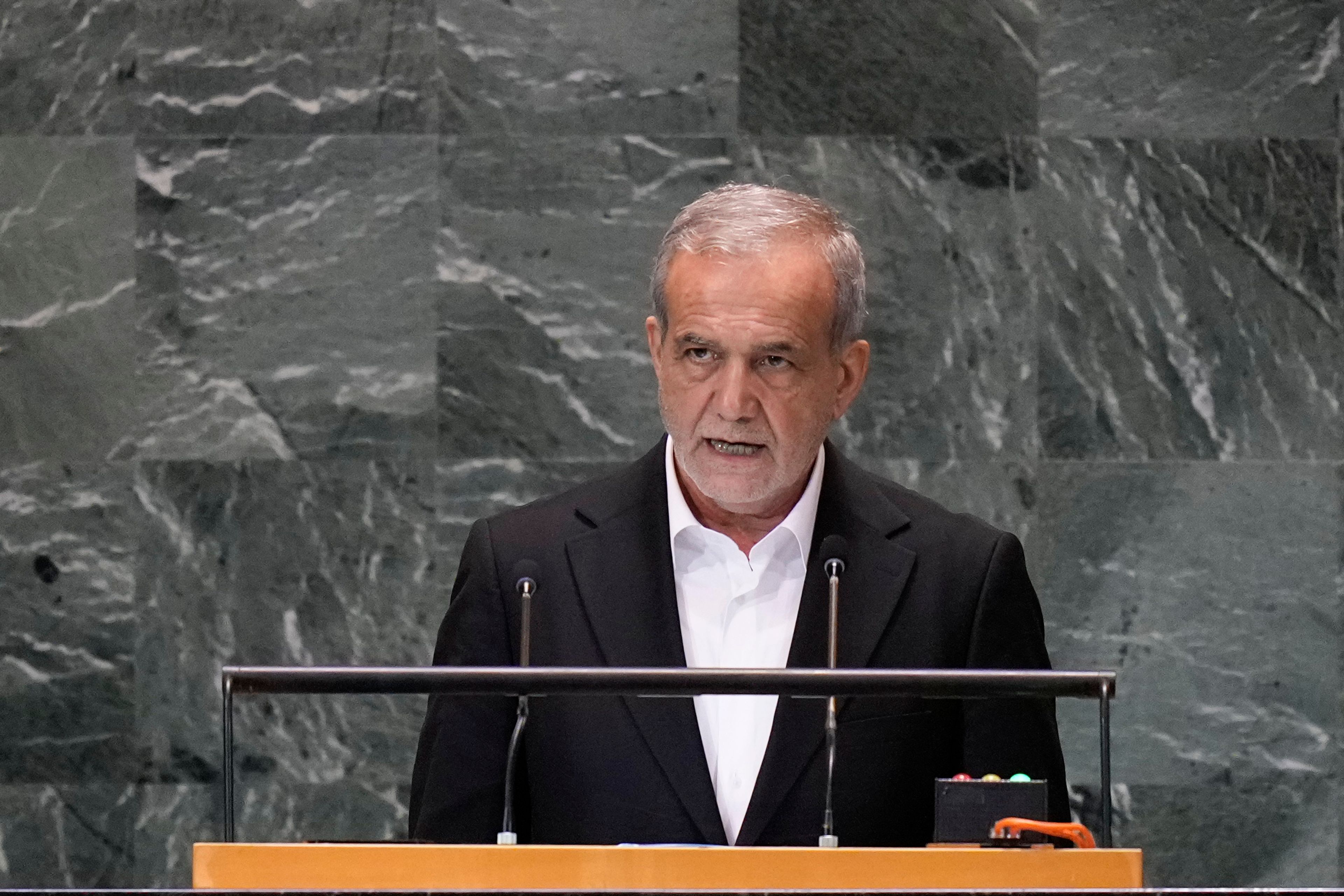 Iran's President Masoud Pezeshkian addresses the the Summit of the Future at United Nations headquarters, Monday, Sept. 23, 2024. (AP Photo/Seth Wenig)