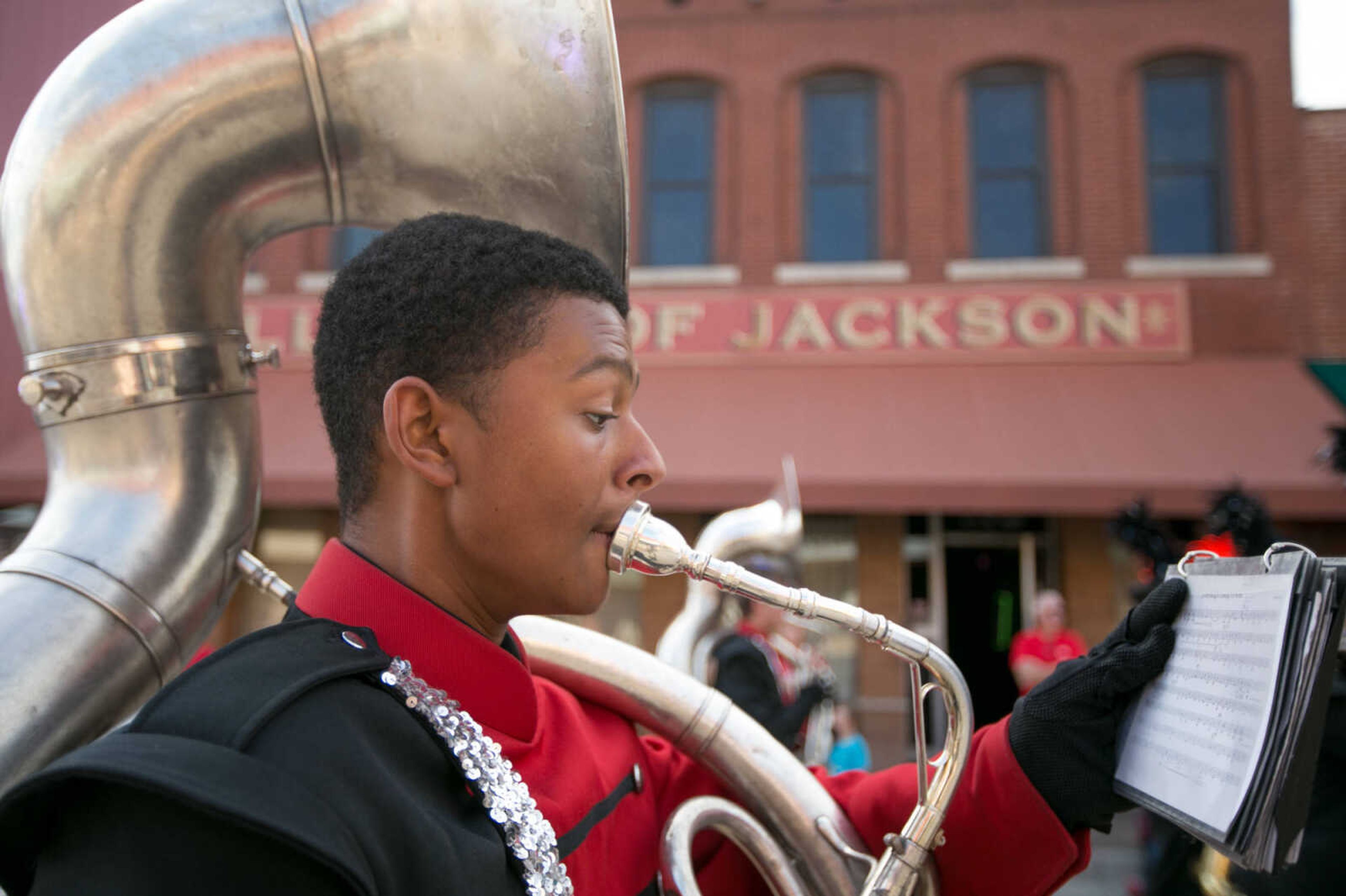 GLENN LANDBERG ~ glandberg@semissourian.com

Members of the Jackson High School Marching Chiefs move in formation down High Street in Uptown Jackson during the Jackson Band Festival parade Tuesday, Oct. 6, 2015.