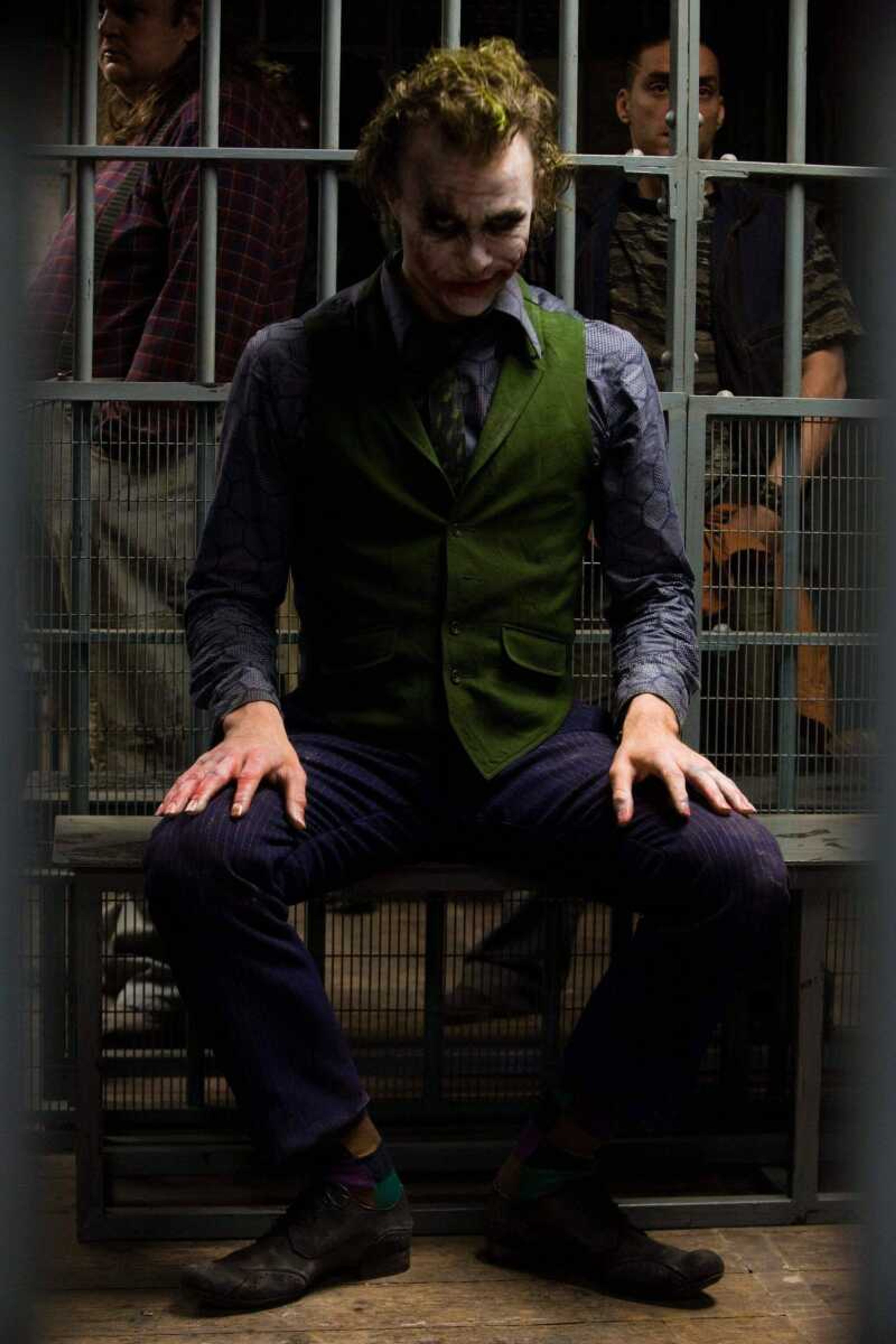 Stephen Vaughan ~ Warner Bros.<br>This photo released by Warner Bros., shows actor Heath Ledger as The Joker in a scene from "The Dark Knight." The popular movie may be a spot of common ground between mainstream moviegoers and the Academy of Motion Pictures Arts and Sciences for the upcoming Oscars.