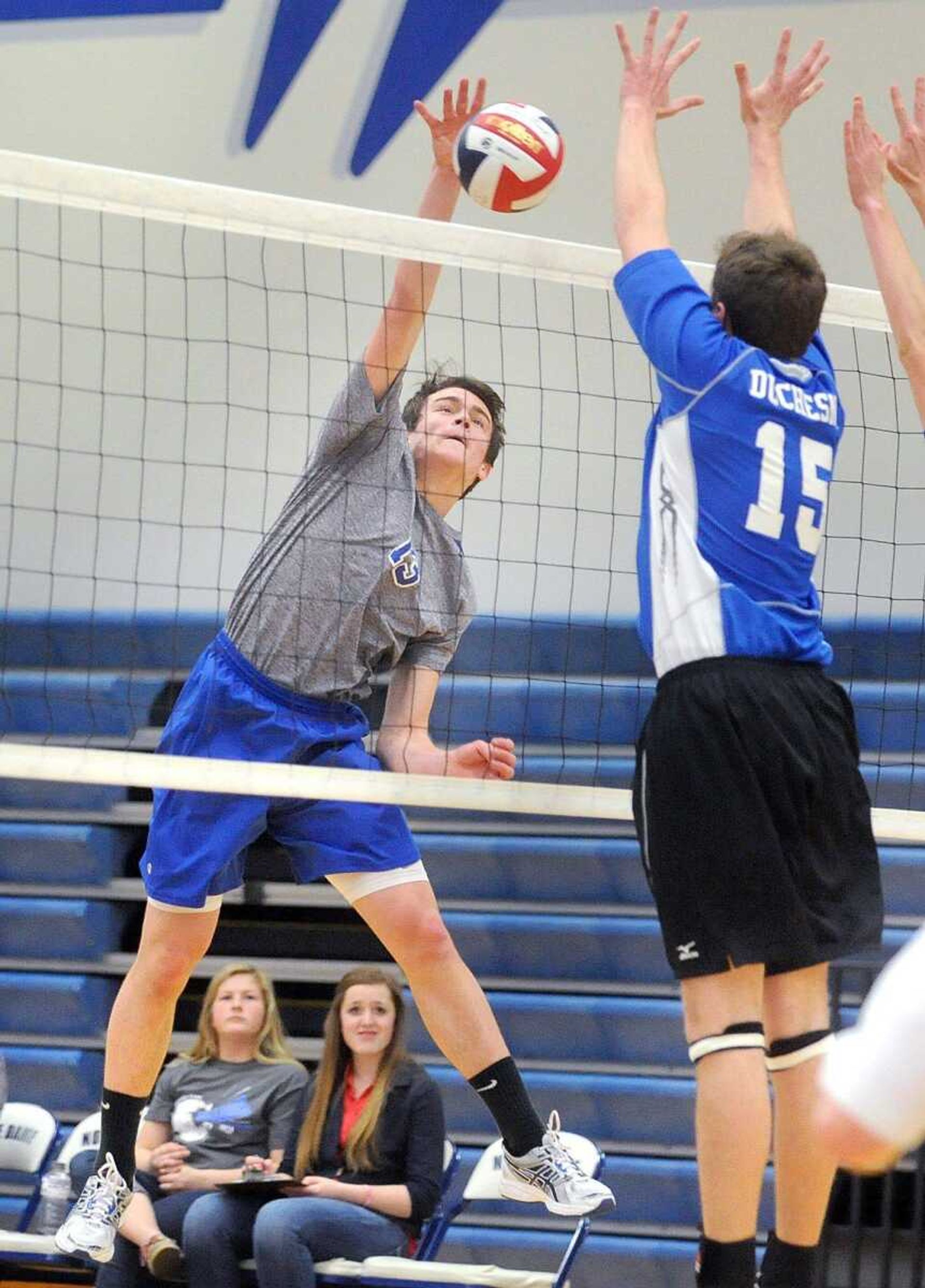 Notre Dame&#8217;s Tyler Allen hits past Duchesne blocker Jack Effertz during the first set.