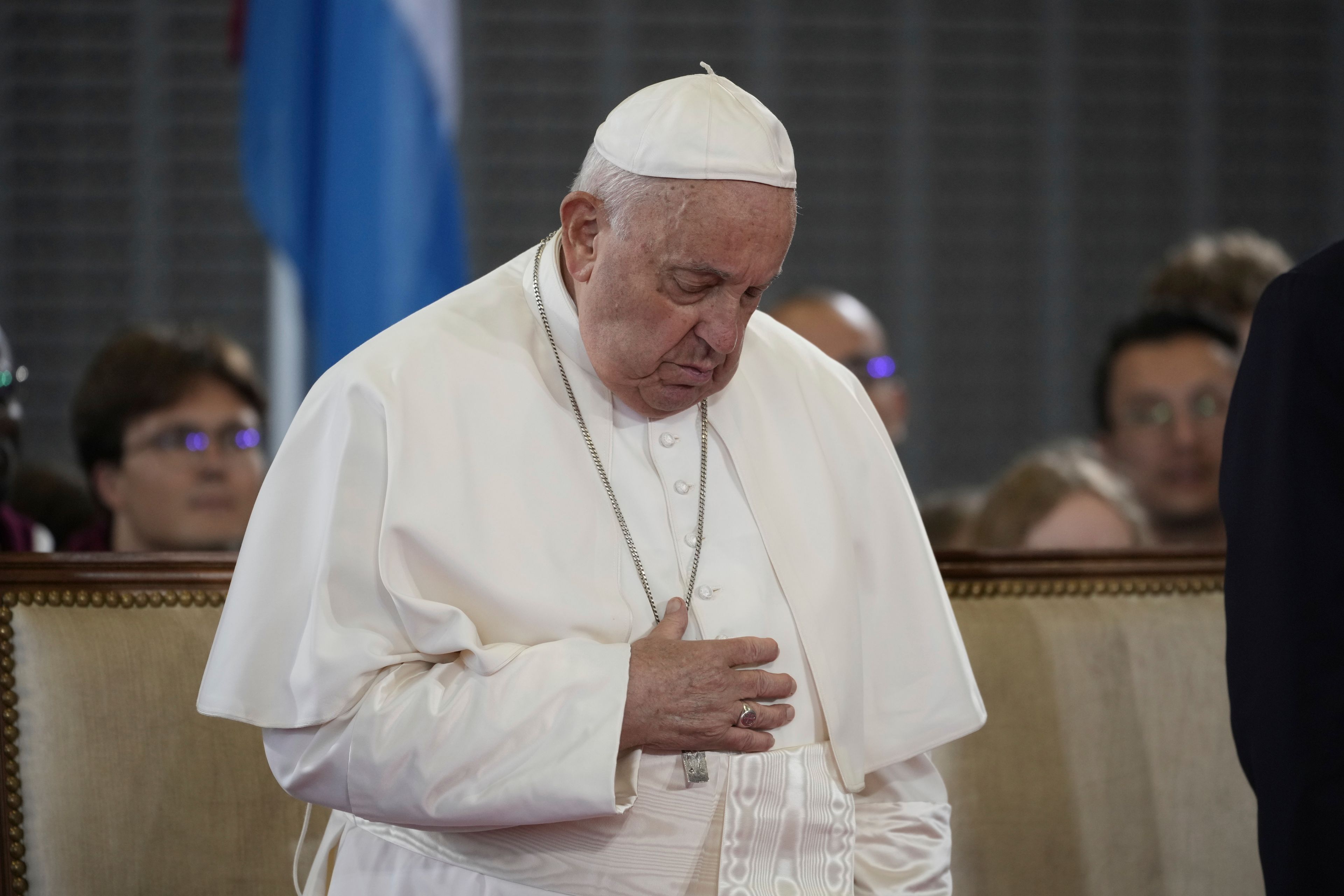 Pope Francis attends the welcome ceremony upon his arrival at Findel International Airport in Luxembourg, Thursday, Sept. 26, 2024. (AP Photo/Andrew Medichini)