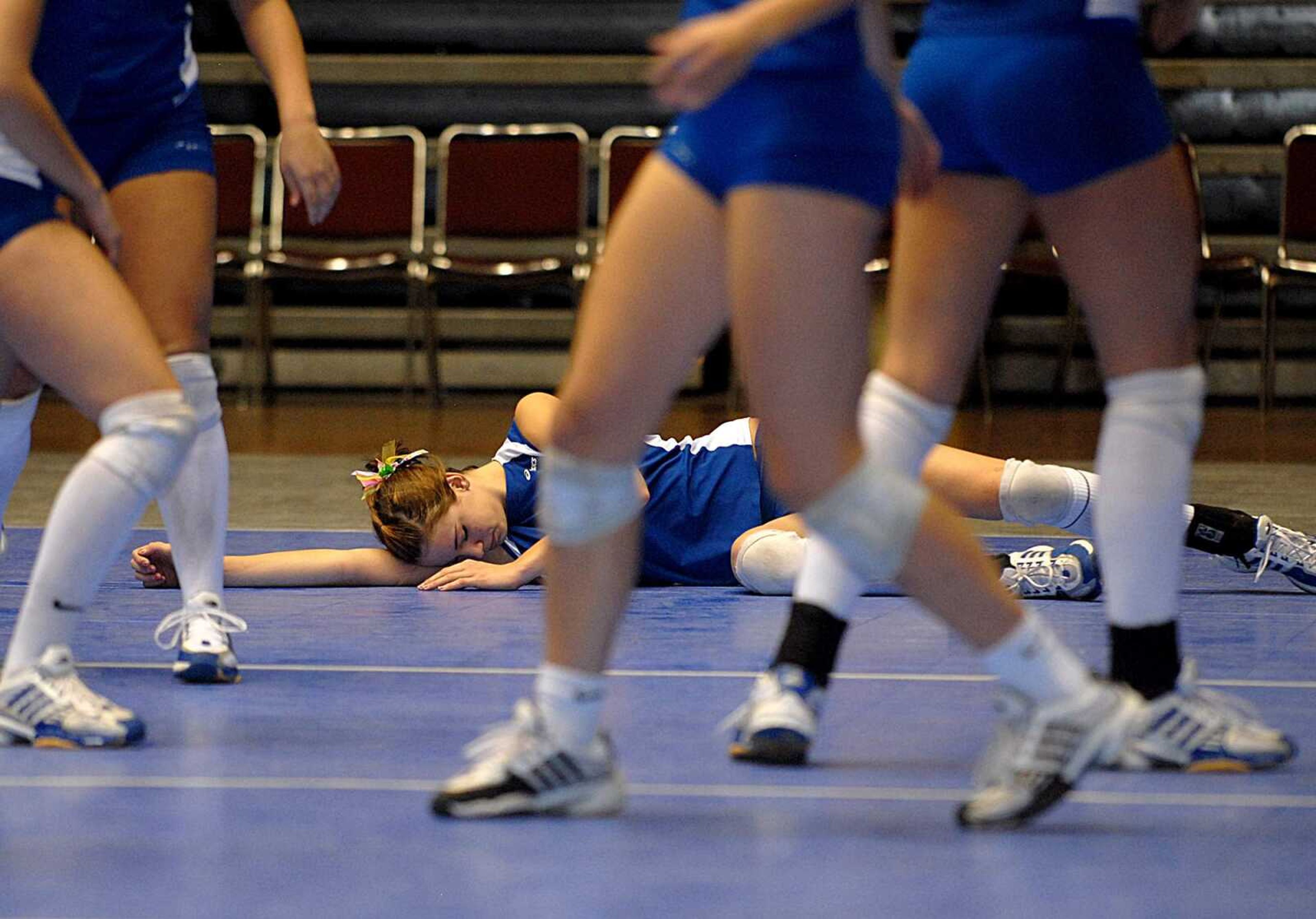 AARON EISENHAUER ~ aeisenhauer@semissourian.com
Katie Hogan lies on the ground after a failed dig during the second game against Hermann during the Class 2 Championship match.