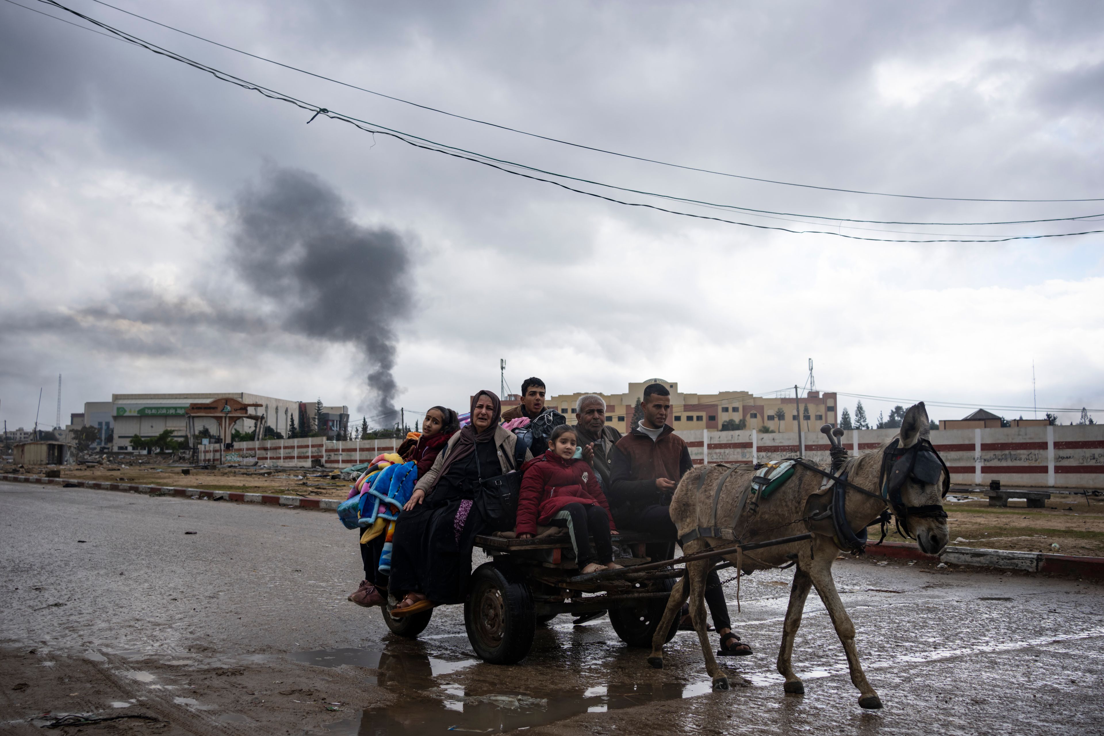 FILE - Palestinians flee from the city of Khan Younis in southern Gaza after an Israeli ground and air offensive on Monday, Jan. 29, 2024. (AP Photo/Fatima Shbair, File)