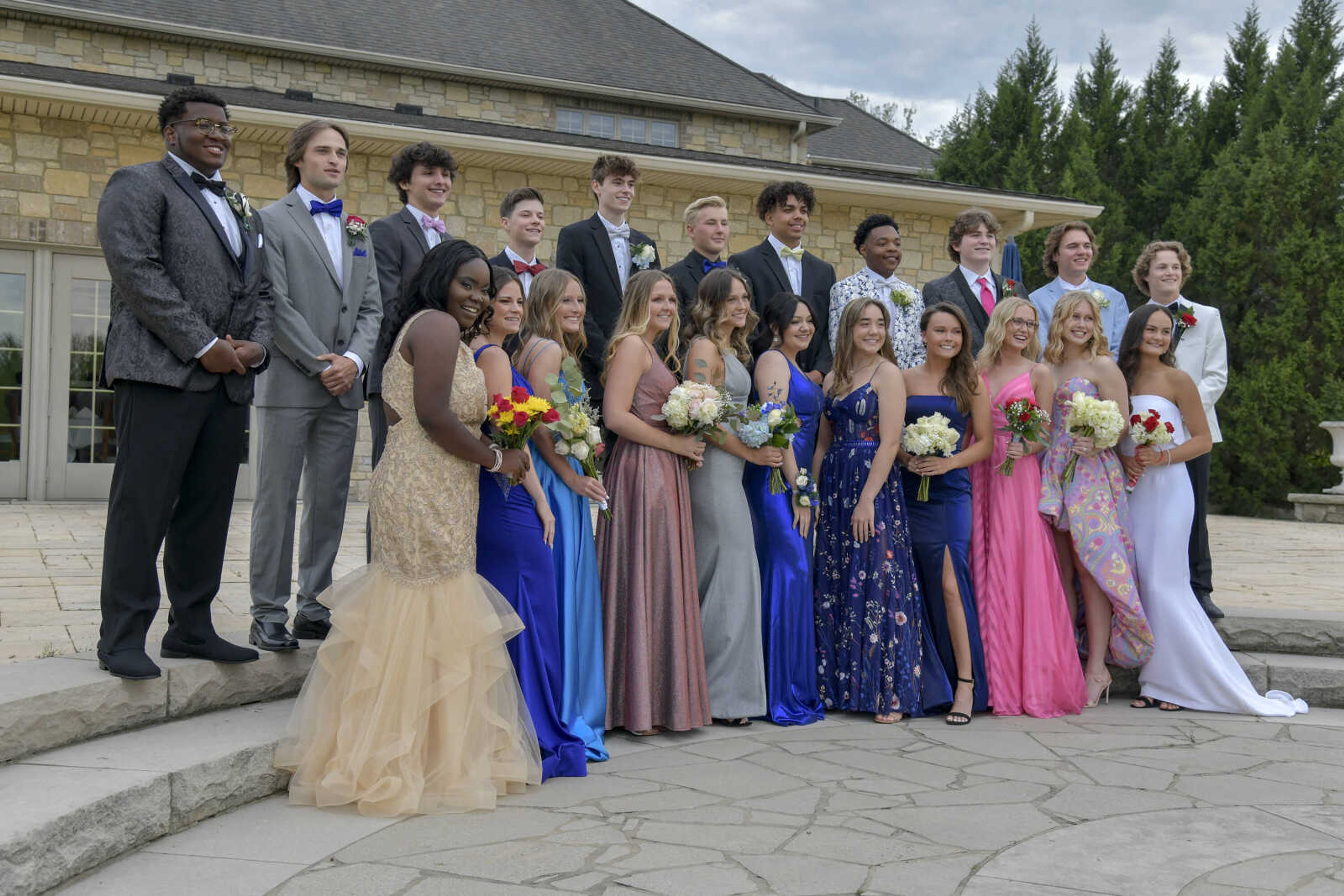 A group of students attending prom pose for a photo during a pre-prom event at the Dalhousie Golf Club in Cape Girardeau on Saturday, May 8, 2021.