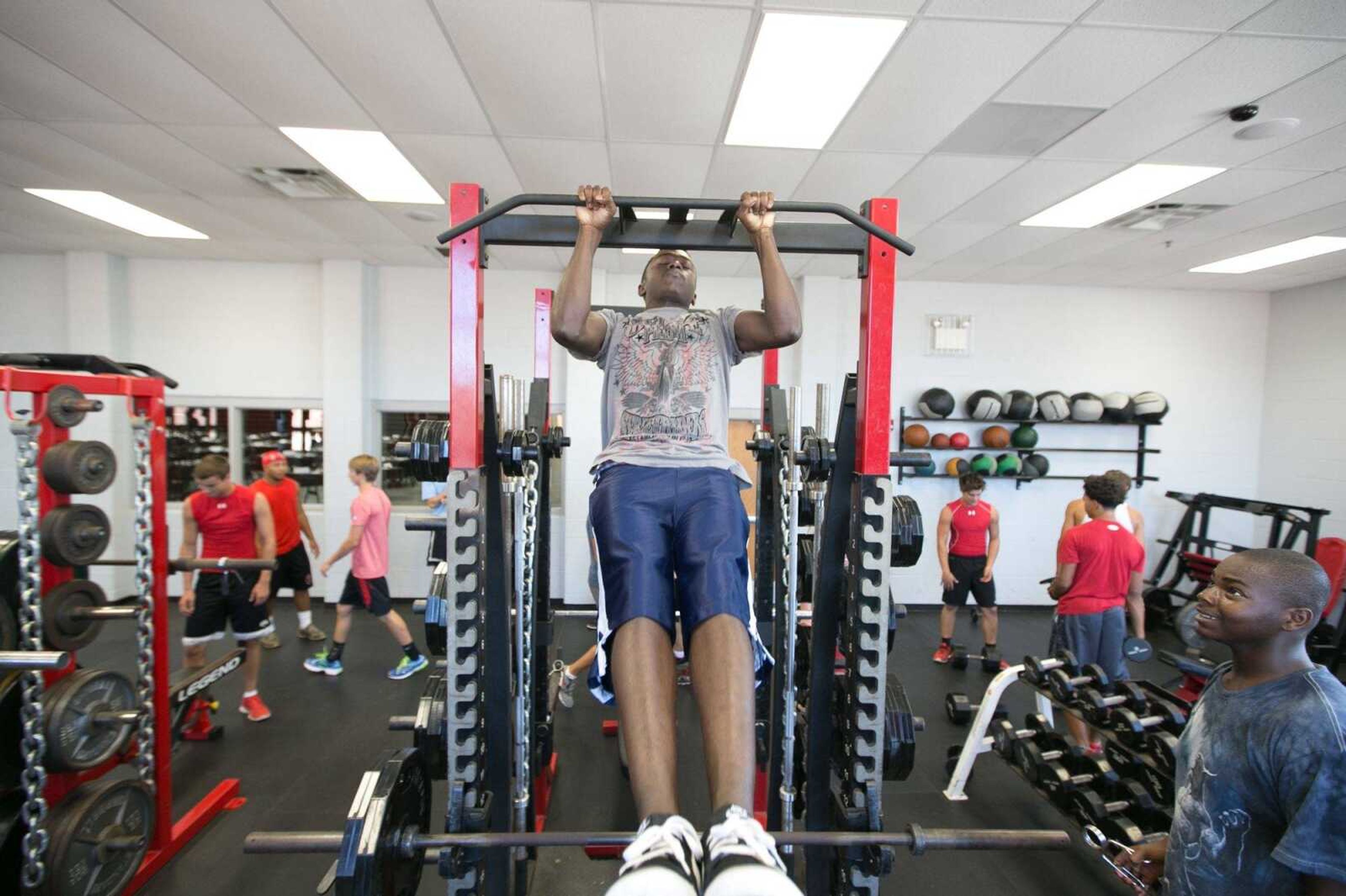 Jackson players workout before practice Tuesday, Aug. 11, 2015 at Jackson High School. (Glenn Landberg)