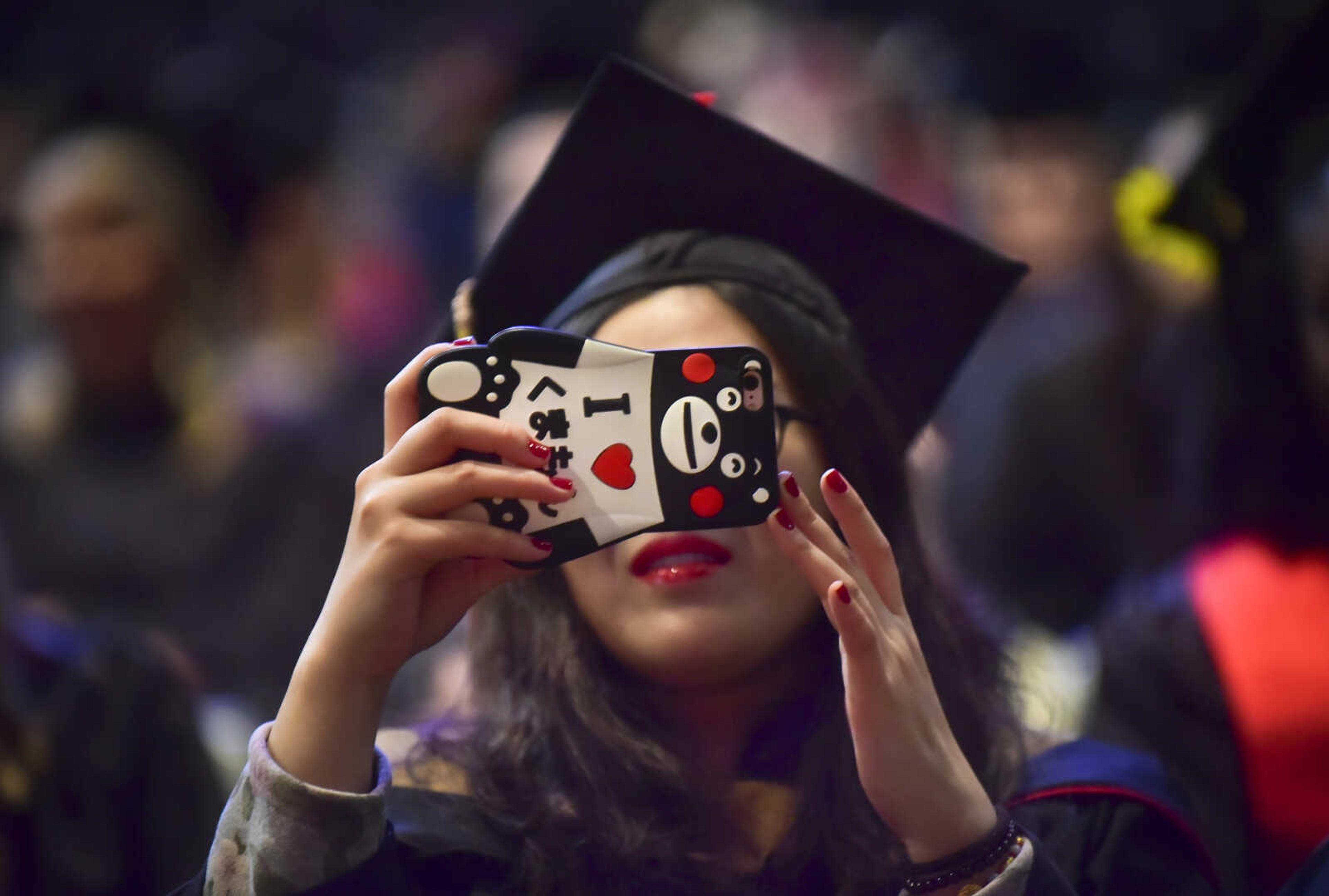 ANDREW J. WHITAKER ~ awhitaker@semissourian.com
A student records the Southeast Missouri State University graduation Saturday, Dec. 17, 2016 at the Show Me Center in Cape Girardeau.