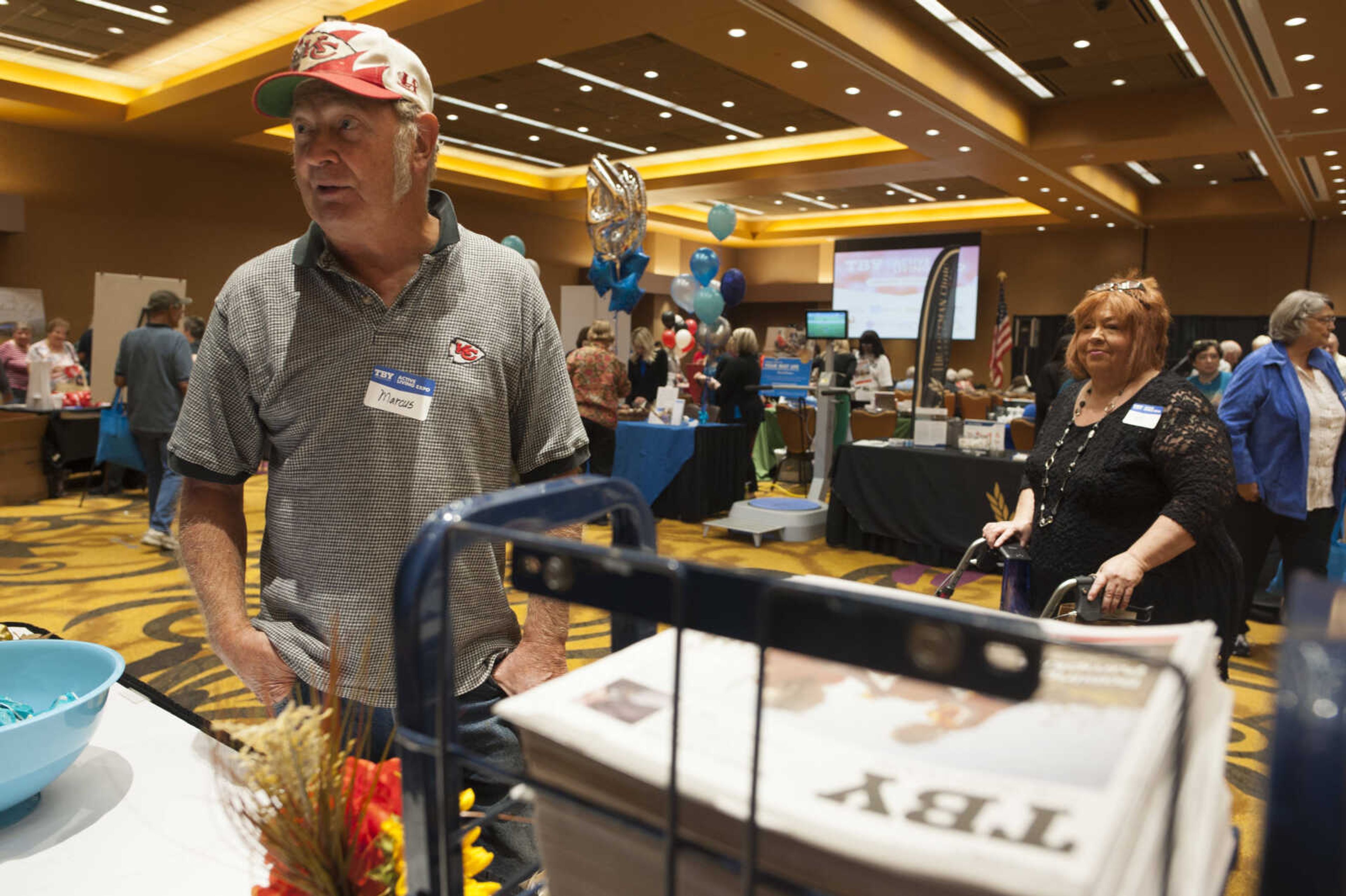 Marcus Schaefer browses the Southeast Missourian and rustmedia booths during the TBY Active Living Expo Wednesday, Oct. 9, 2019, at the Isle Casino in Cape Girardeau.