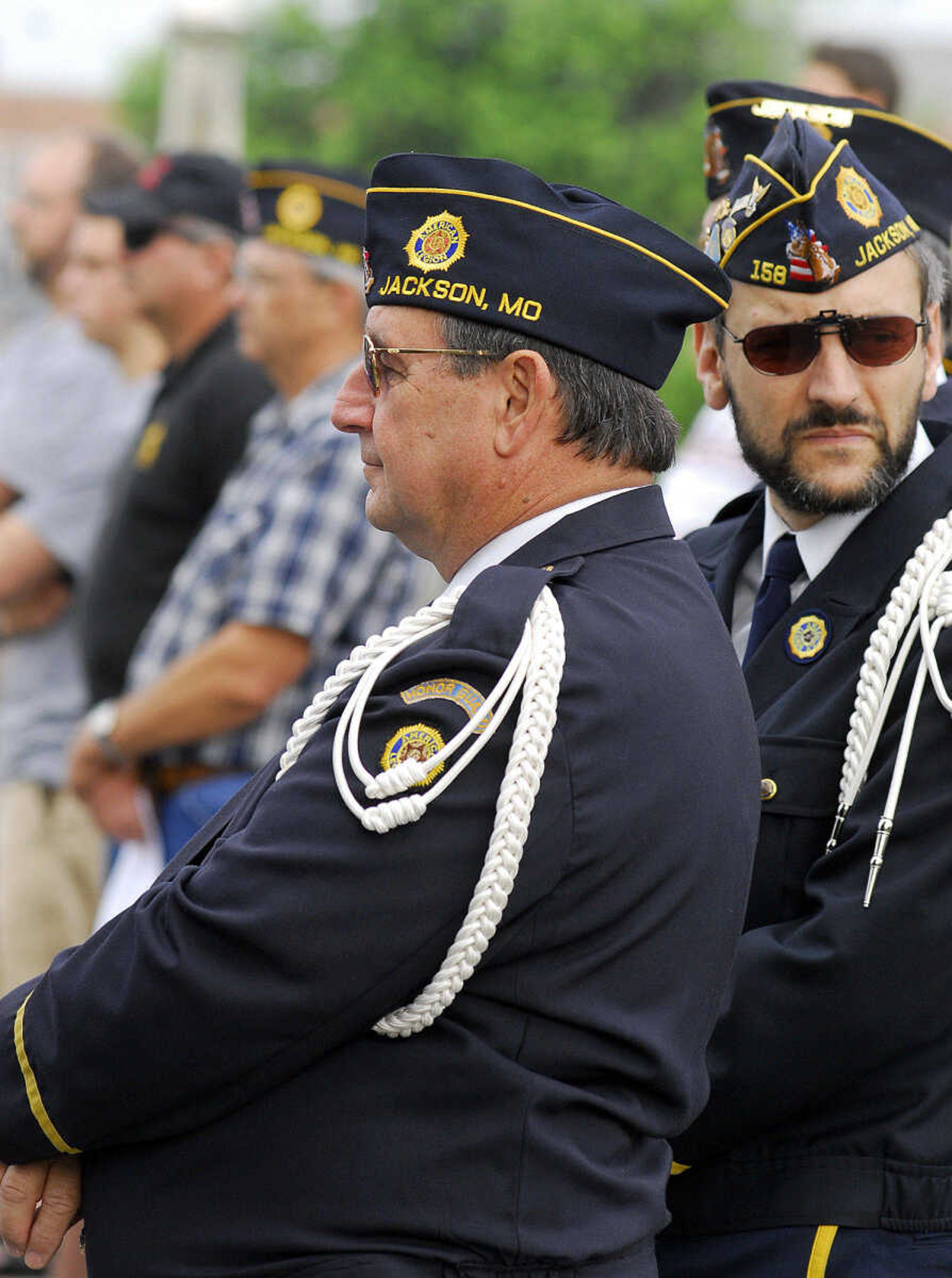 LAURA SIMON~lsimon@semissourian.com
Larry Koehler, front, and Gerry Keene III of American Legion Post 158 listen to the Jackson Municipal Band perform Monday, May 31, 2010 during the Jackson Memorial Day Ceremony.