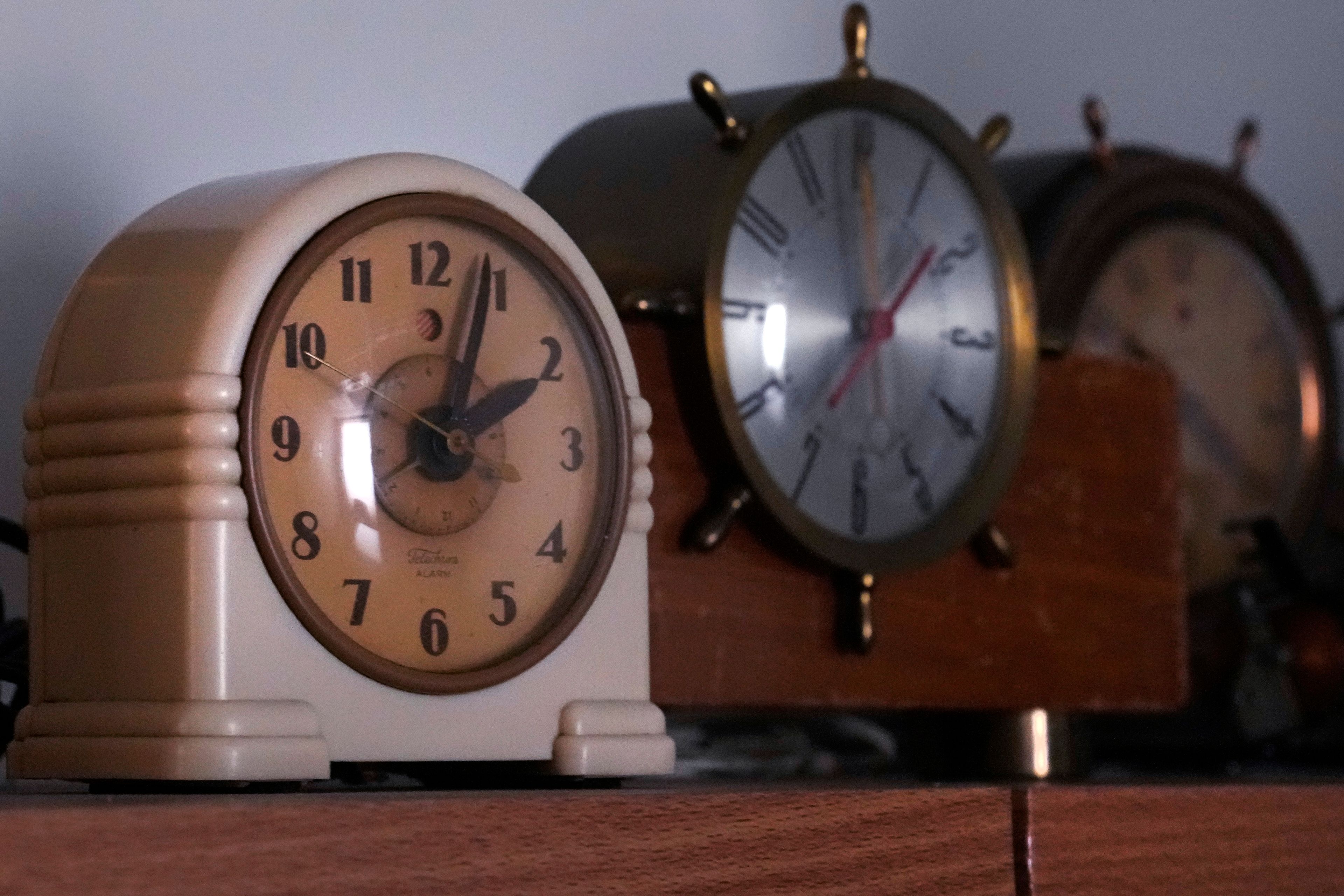 Vintage clocks are displayed at the Electric Time Company, Wednesday, Oct. 30, 2024, in Medfield, Mass. (AP Photo/Charles Krupa)