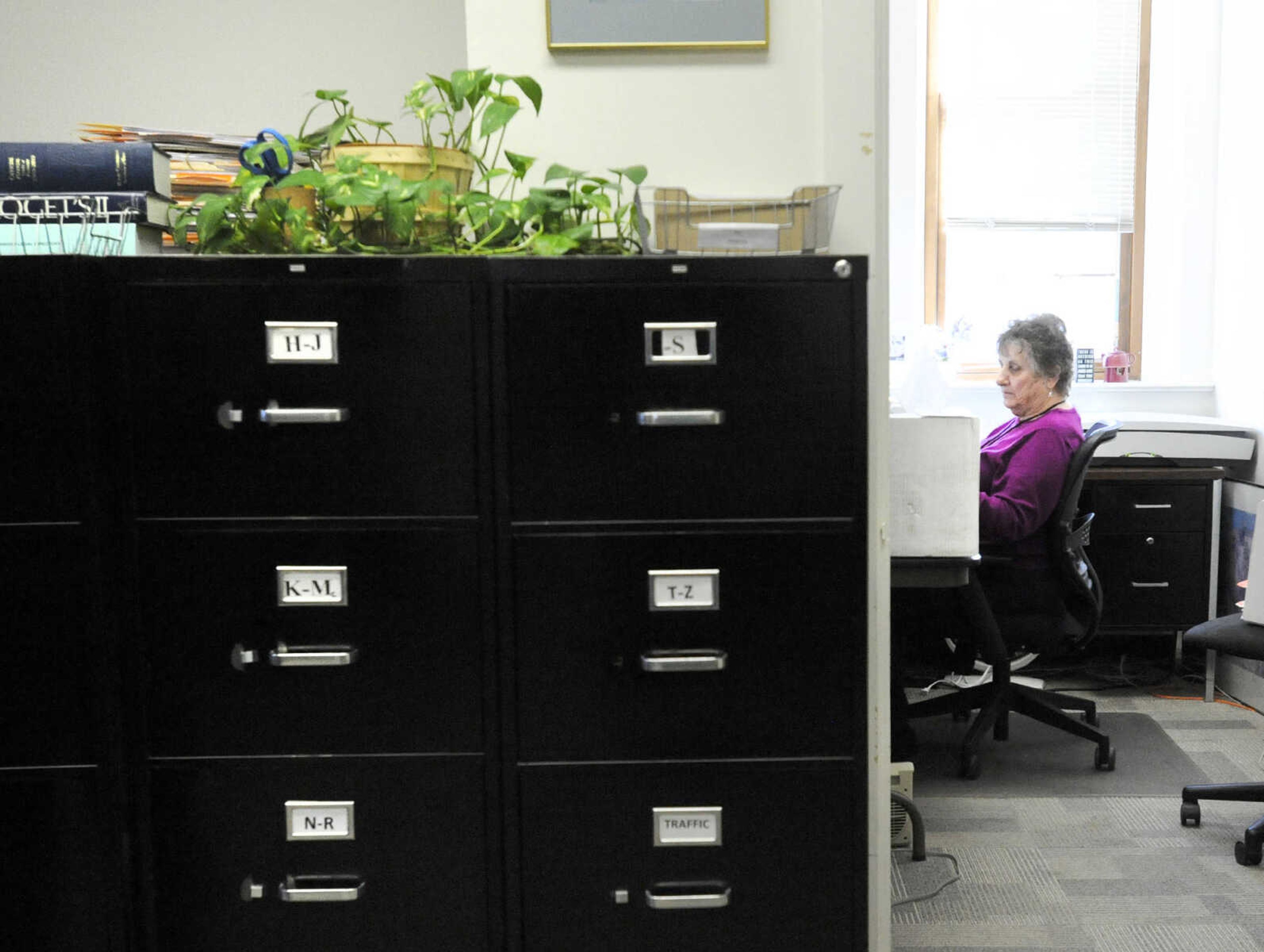 LAURA SIMON ~ lsimon@semissourian.com

Sue Busche, an optic/scanner tech, works inside her office at the Cape Girardeau County Courthouse in Jackson, Missouri, Wednesday, Feb. 18, 2015.