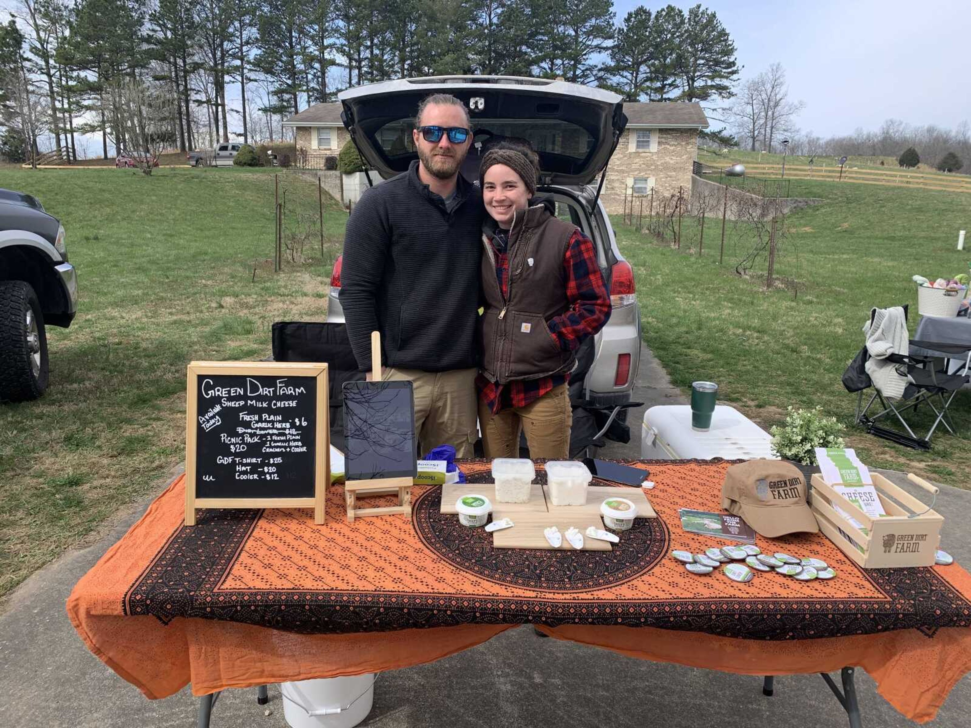 Josh Chenoweth and Eliza Spertus from Green Dirt Farm, from Weston, MO, sold sheep cheese and provided visitors with information on how the cheese they sell is produced.