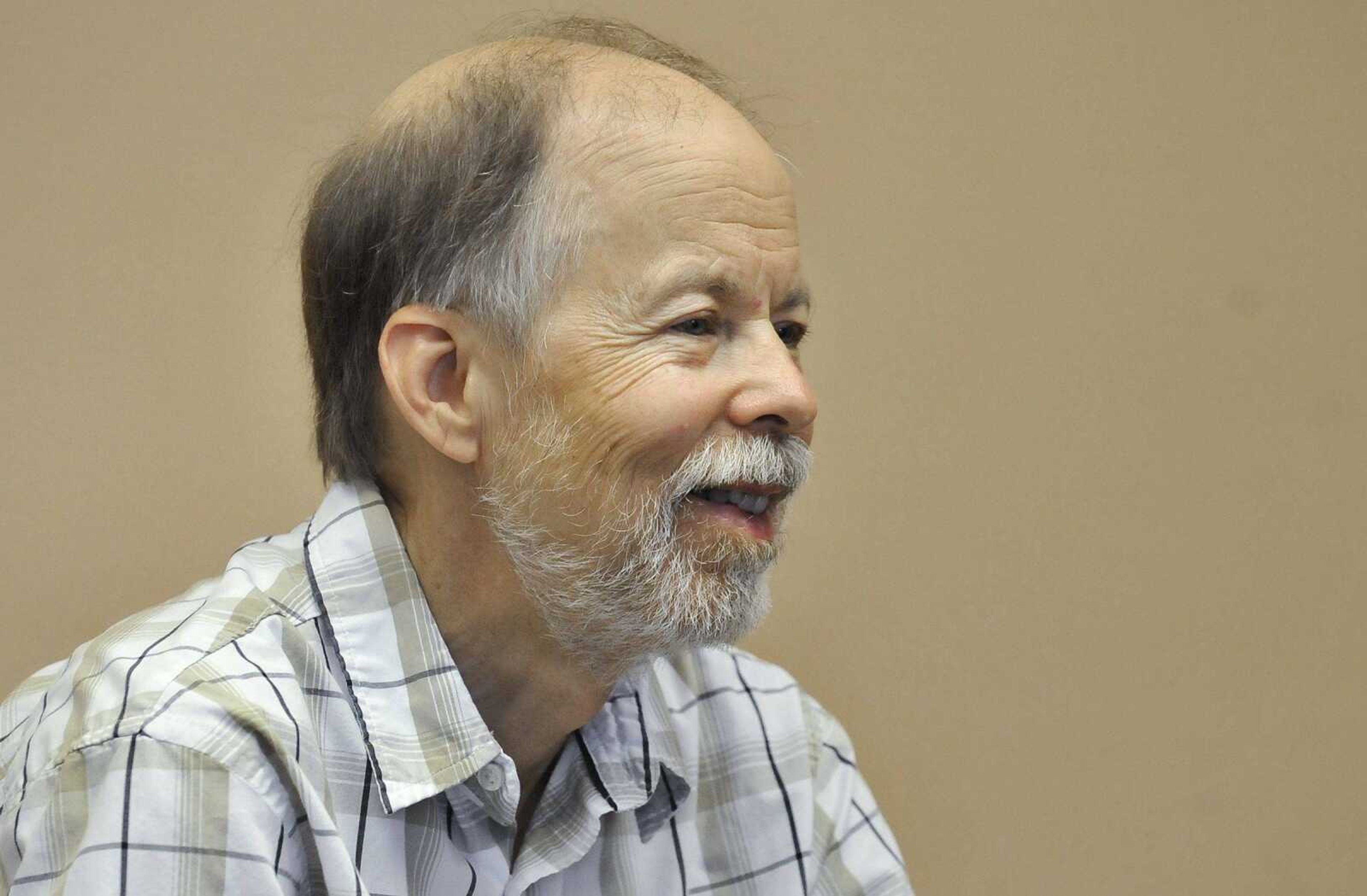 Southeast Missourian photojournalist, Fred Lynch, is seen on assignment on Tuesday, June 6, 2017, at the Cape Girardeau Senior Center.