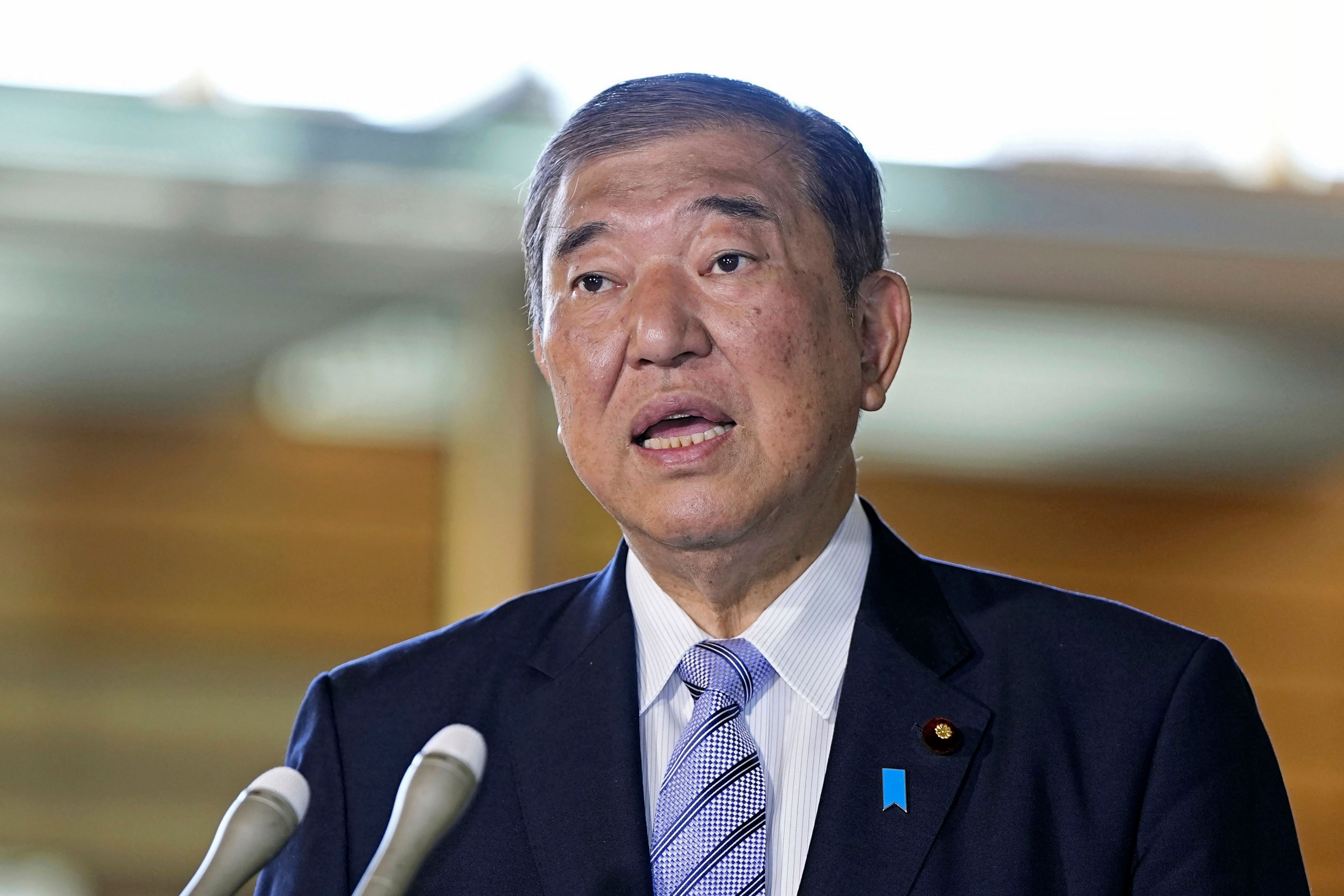 Japan's Prime Minister Shigeru Ishiba speaks to the journalists after a report of North Korea's missile launch, at his office in Tokyo Thursday, Oct. 31, 2024. (Kyodo News via AP)