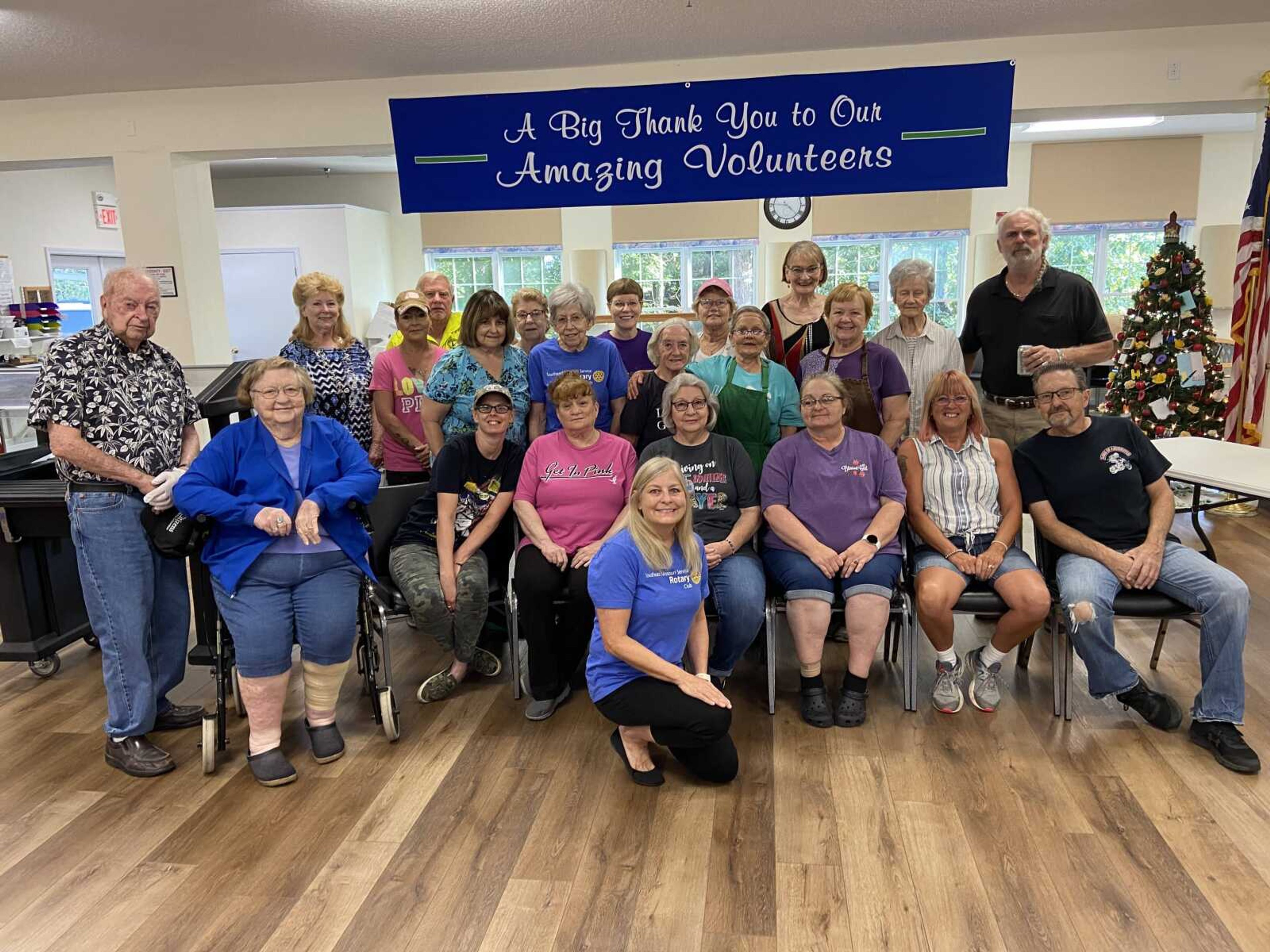 Volunteers for the Meals and Wheels Program at the Jackson Senior Center with Rotary members.