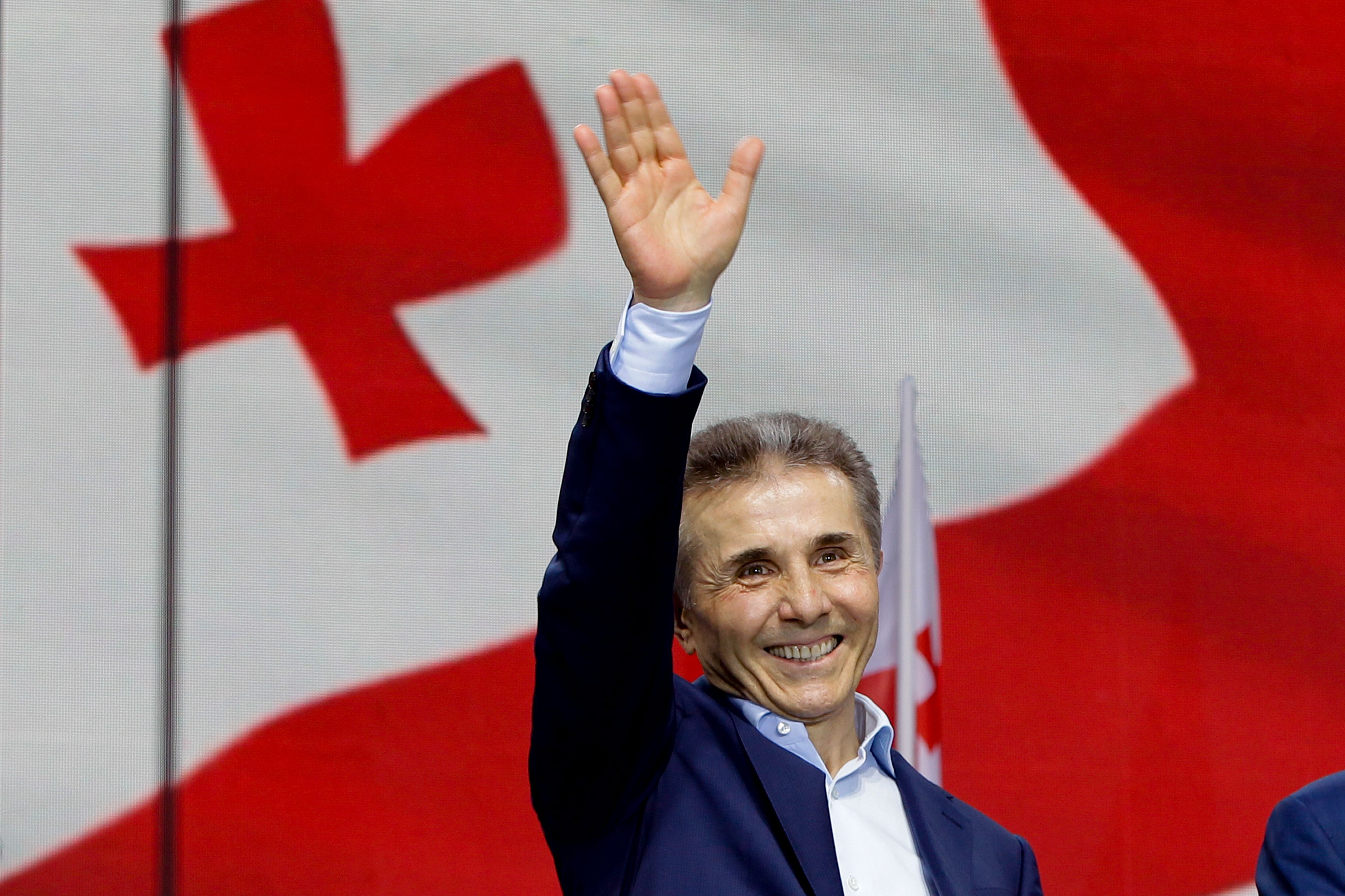 FILE - Billionaire Bidzina Ivanishvili, leader of the created by him the Georgian Dream party greets demonstrators during a rally in Tbilisi, Georgia, on April 29, 2024. (AP Photo/Shakh Aivazov, File)