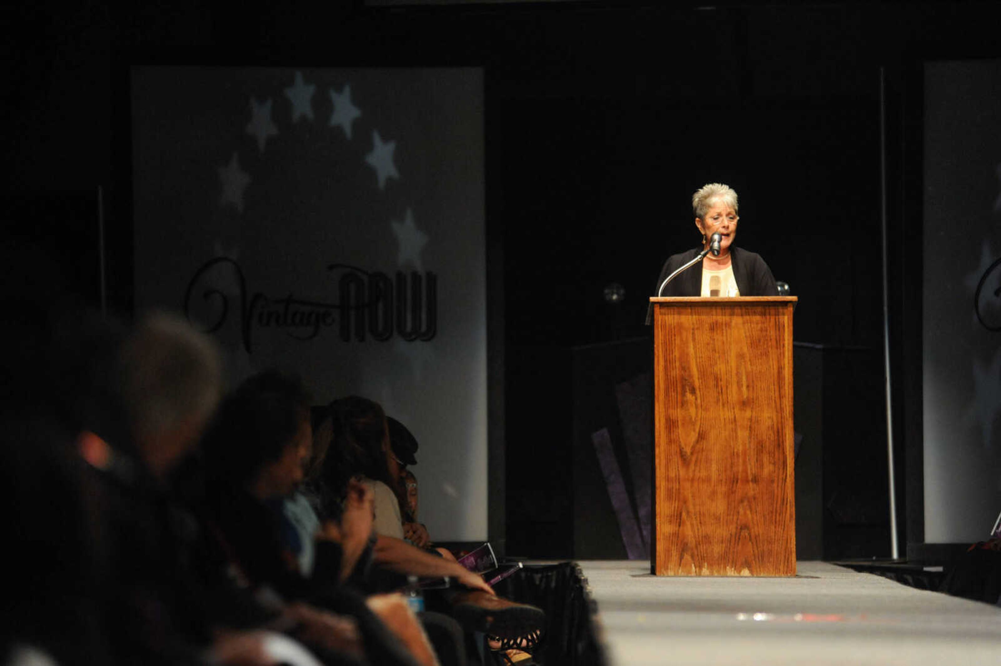 GLENN LANDBERG ~ glandberg@semissourian.com


Sharon Carlquist delivers a personal speech to the crowd during the VintageNOW fashion show at the Osage Centre on Saturday, October 24, 2015. Proceeds benefited the Safe House for Women.