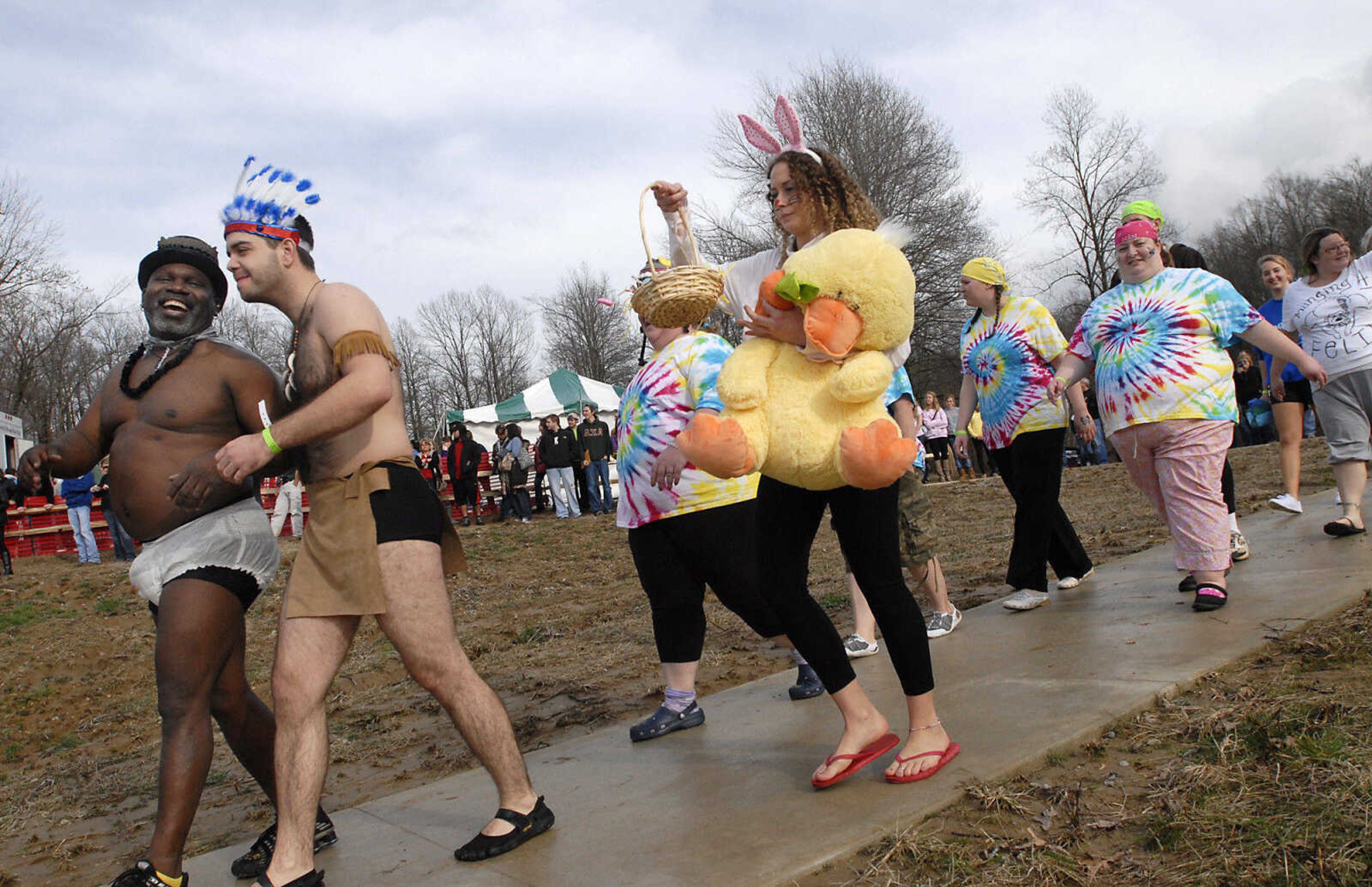 KRISTIN EBERTS ~ keberts@semissourian.com

Teams show off their costumes in a parade during the 2012 Polar Plunge at the Trail of Tears State Park's Lake Boutin on Saturday, Feb. 4, 2012.