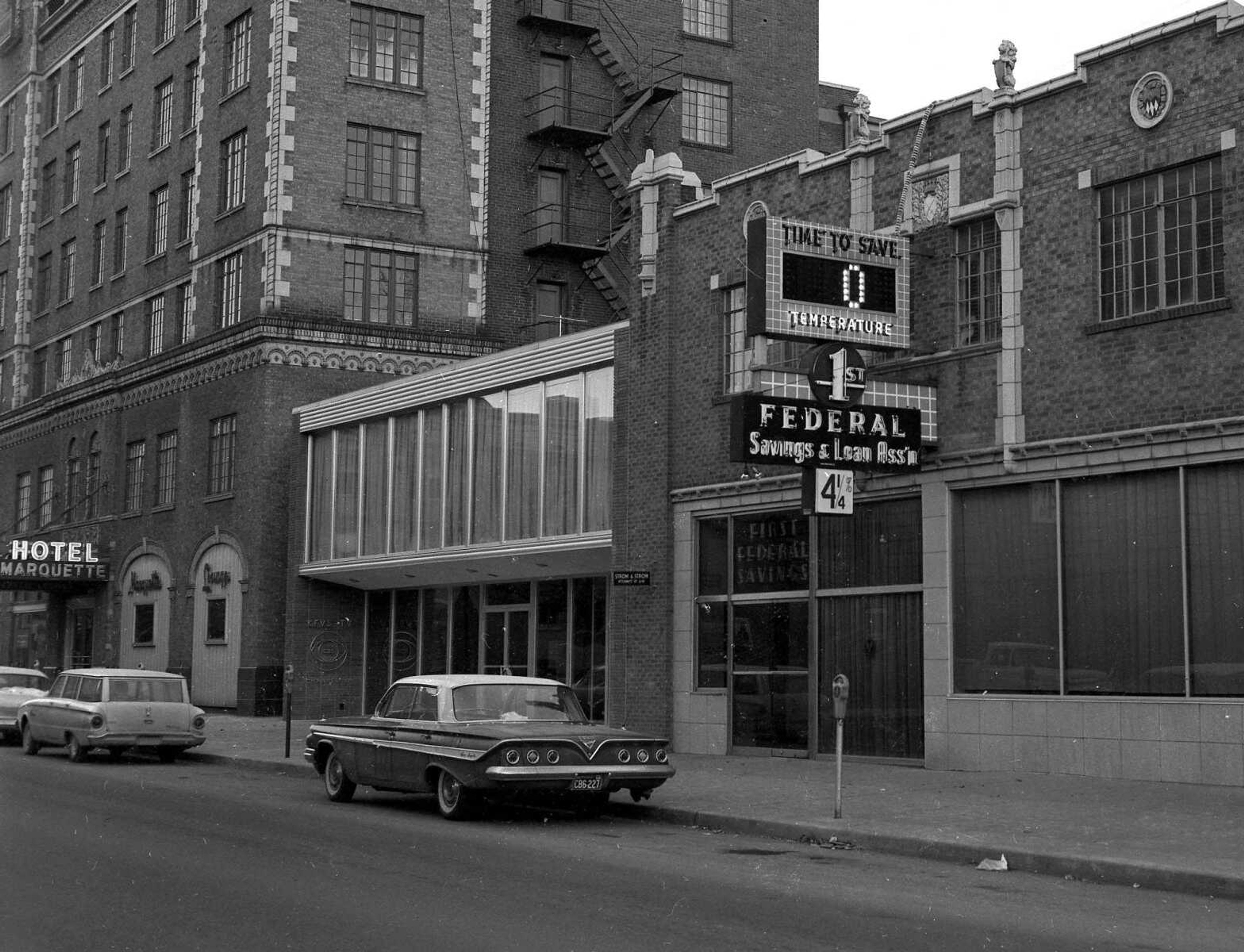 This photograph shows the north side of the 300 block of Broadway. Note the presence of parking meters.