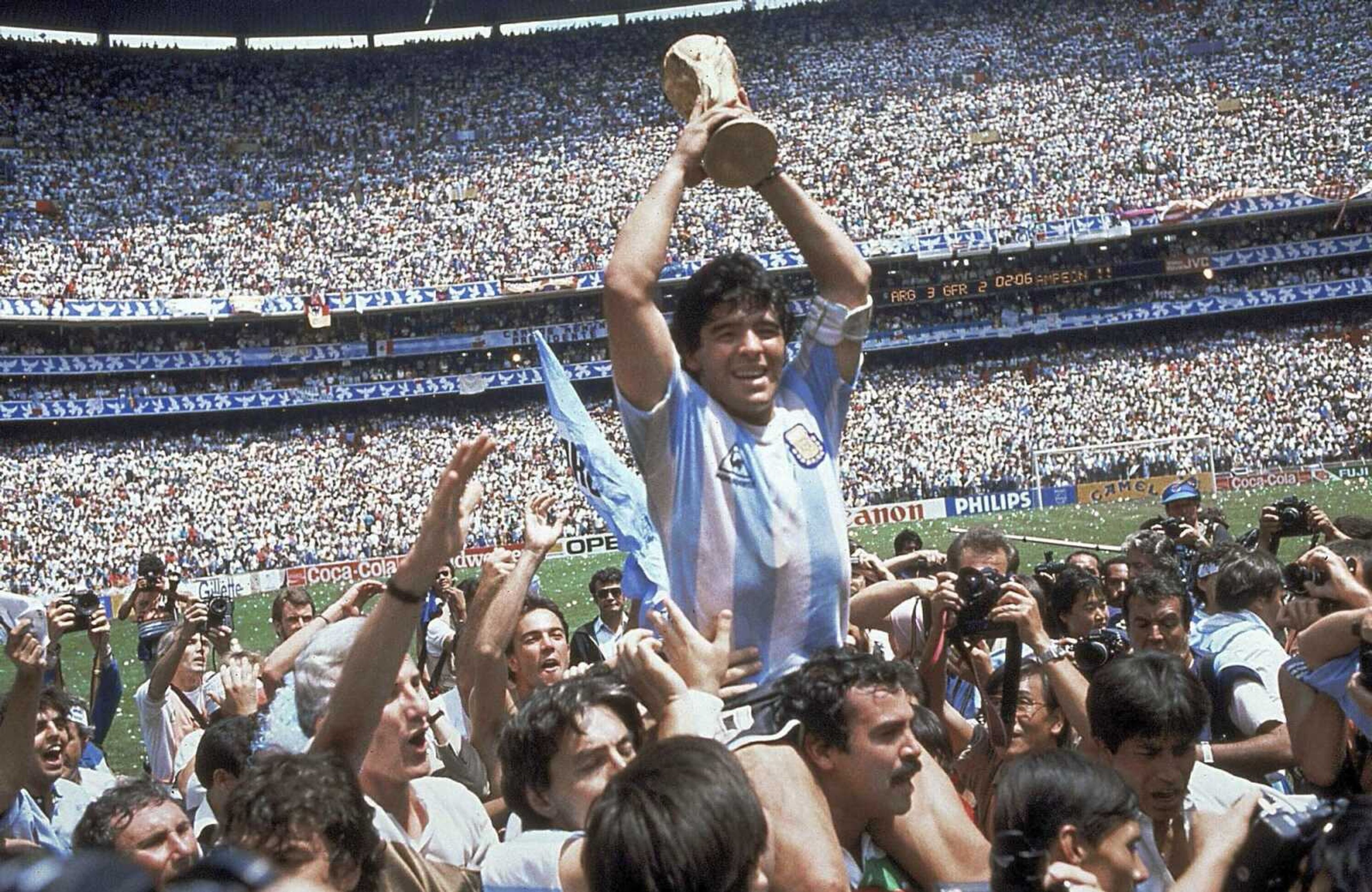 Argentina's Diego Maradona holds up the World Cup trophy in 1986.